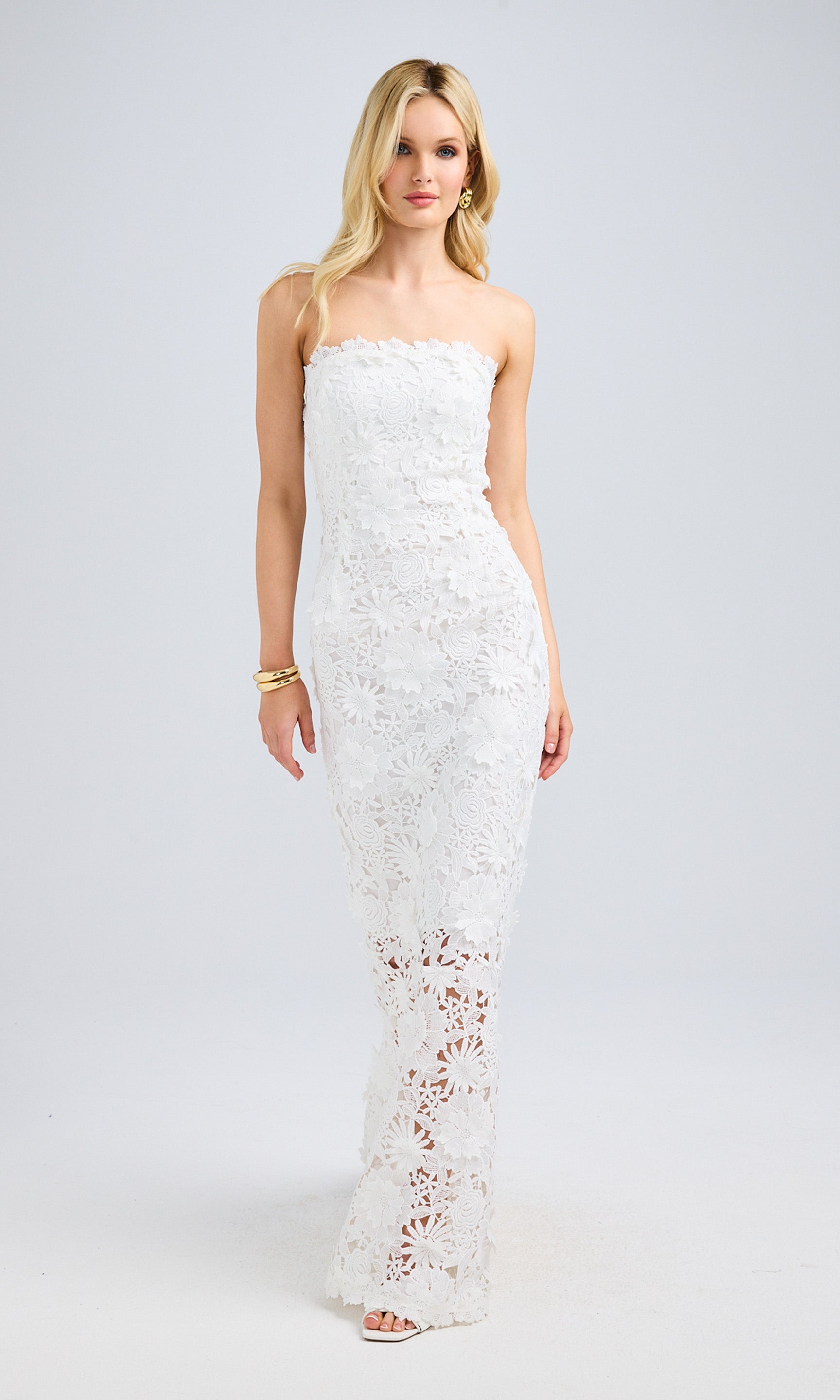 Full-body front view of the model in the lace gown, emphasizing the elegant floor-length fit and lace detailing.