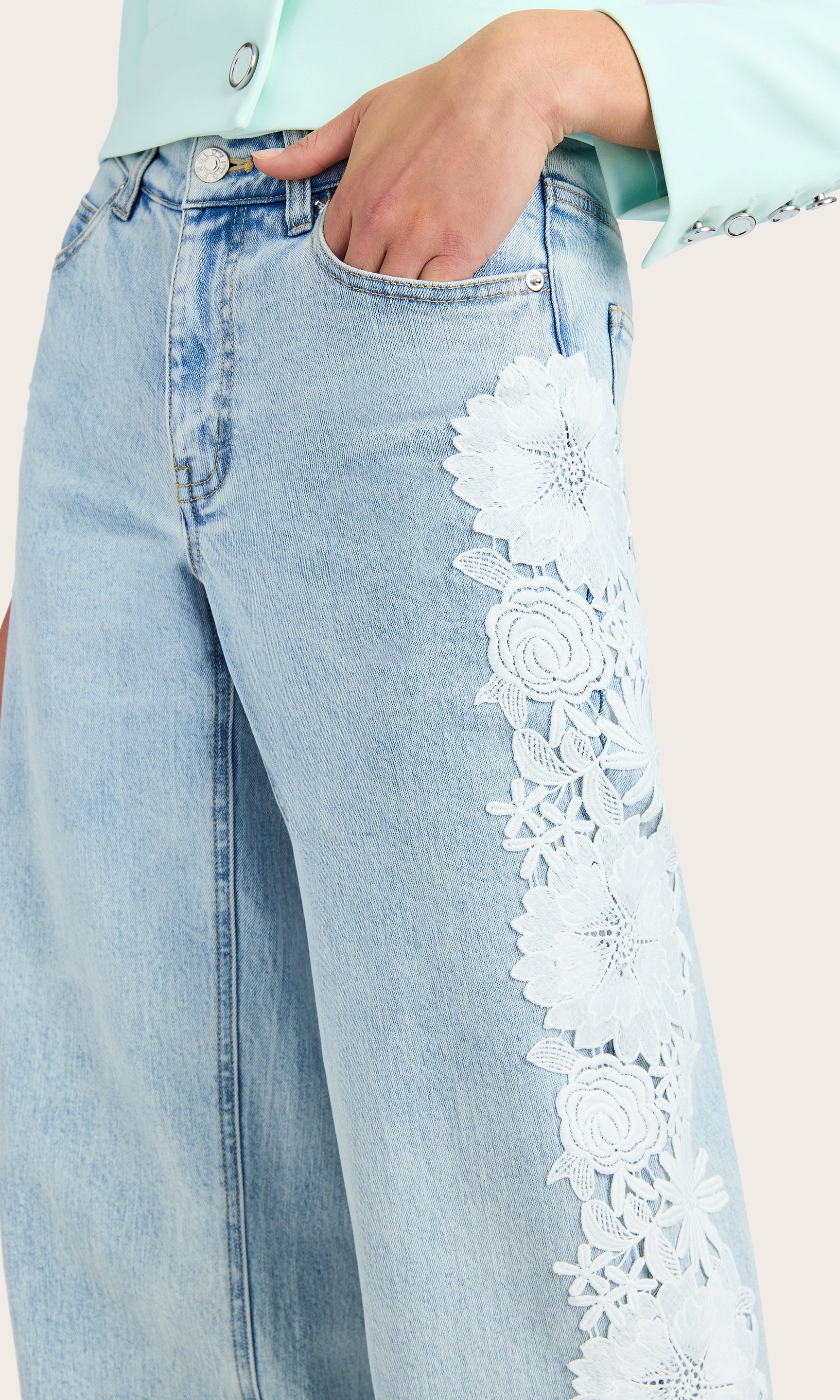 Close-up view of the Jethro Lace Combo Denim Jeans showing the lace detail on the leg