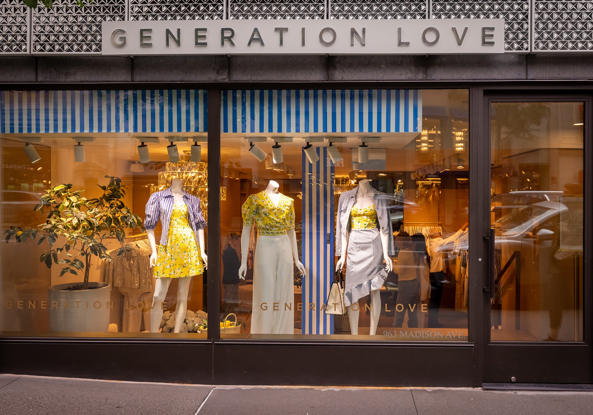 image of our Generation Love physical store on Madison Avenue in NY displaying our summer trending styles: yellow florals, blue/white striped styles and light denim wear