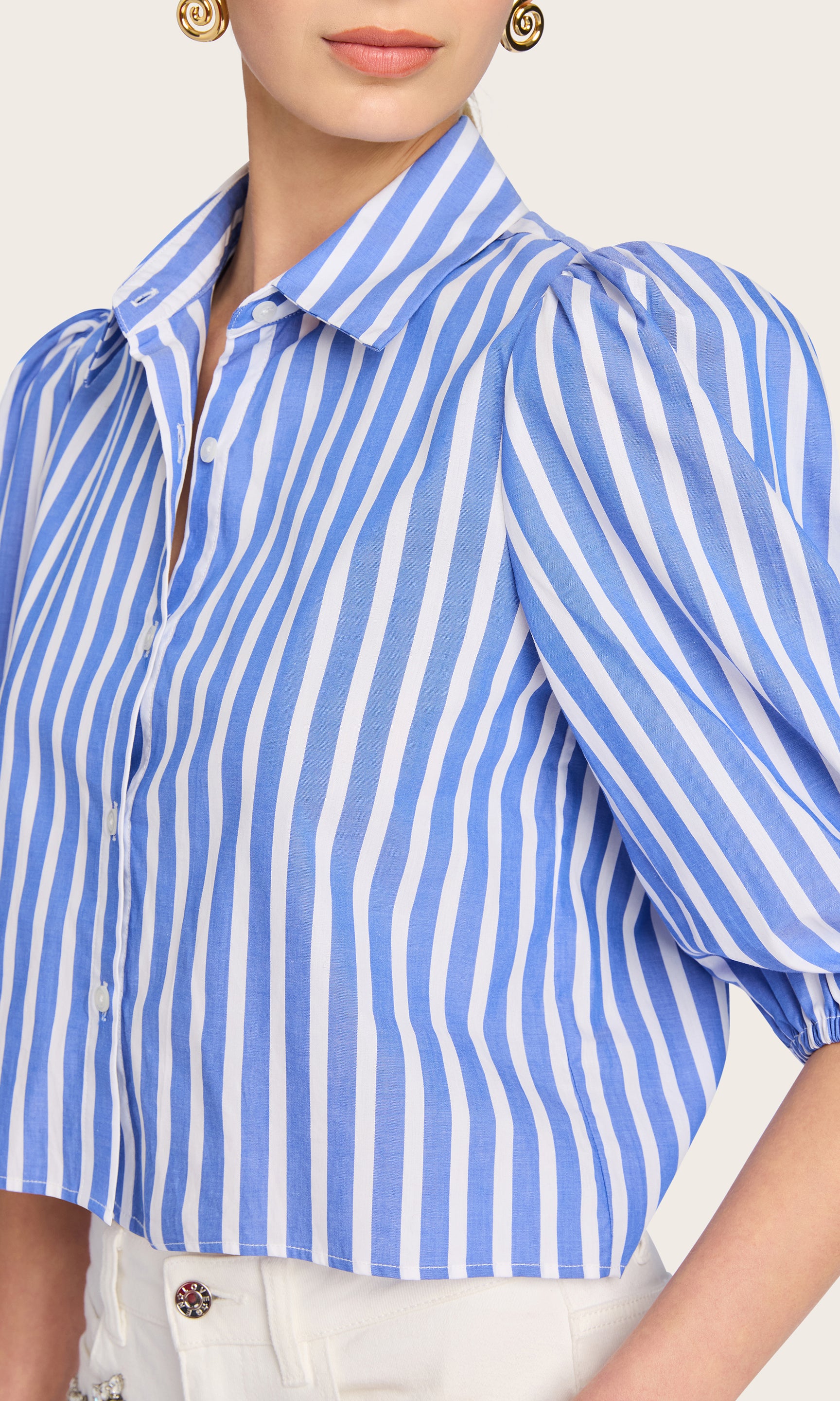 Close-up side view of the Tammy Wide Stripe Shirt, capturing the balloon sleeve volume and crisp poplin texture.