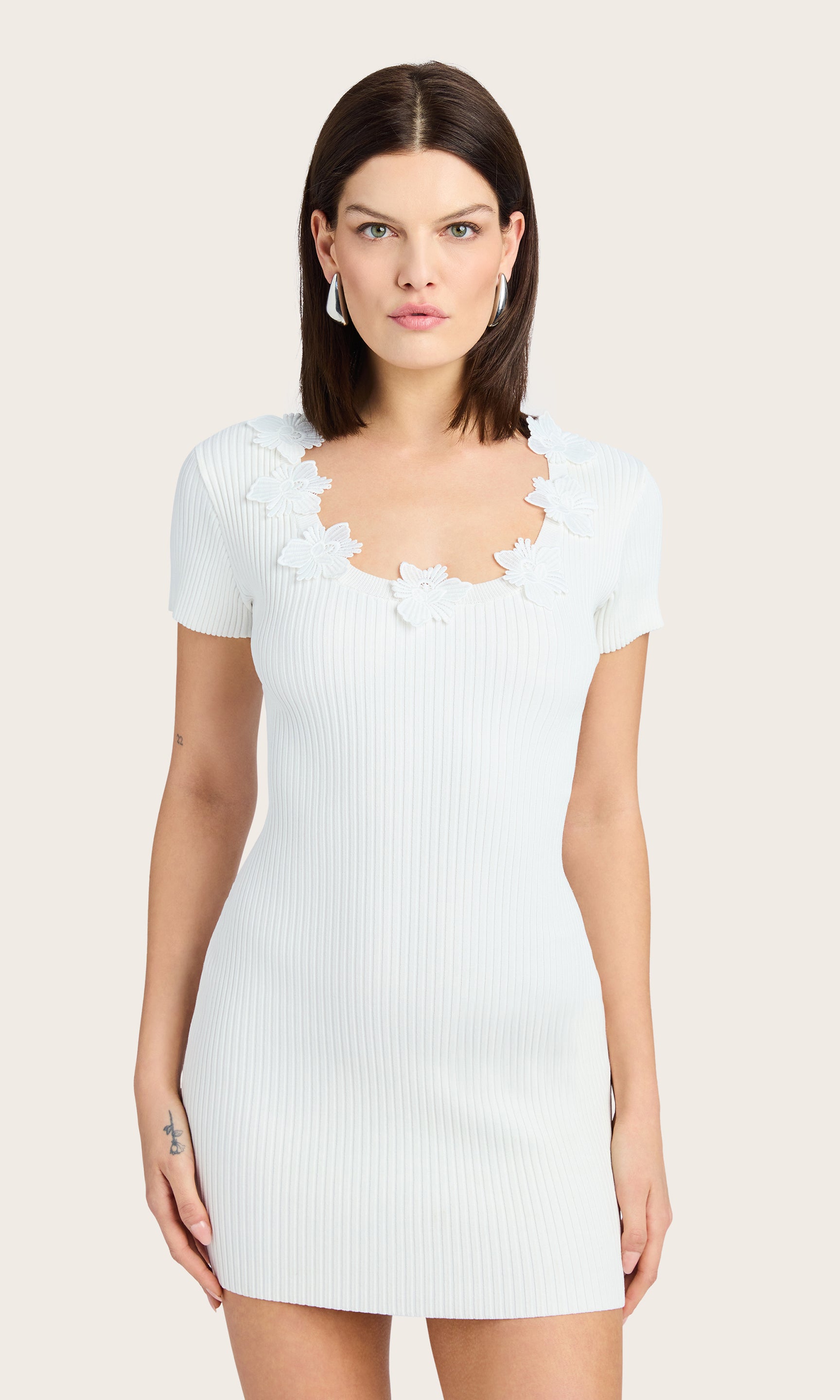 Front view of the Vallea Sweater Dress showcasing its slim silhouette