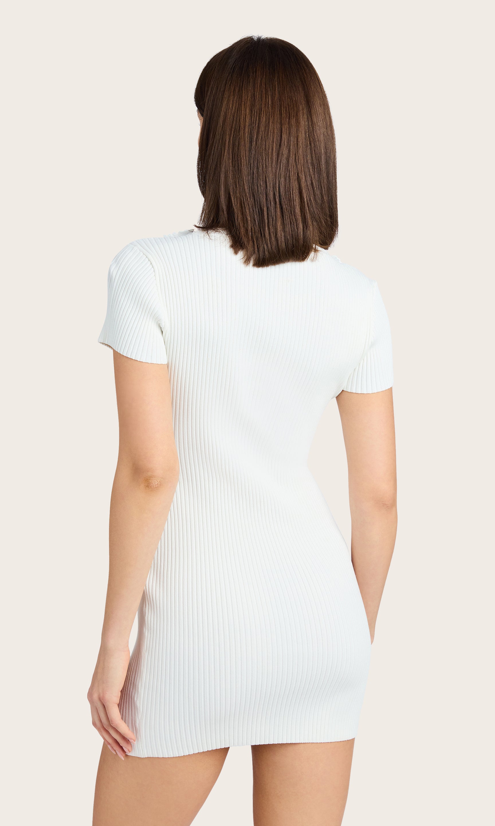 Rear view of the Vallea Sweater Dress showing the rib knit texture