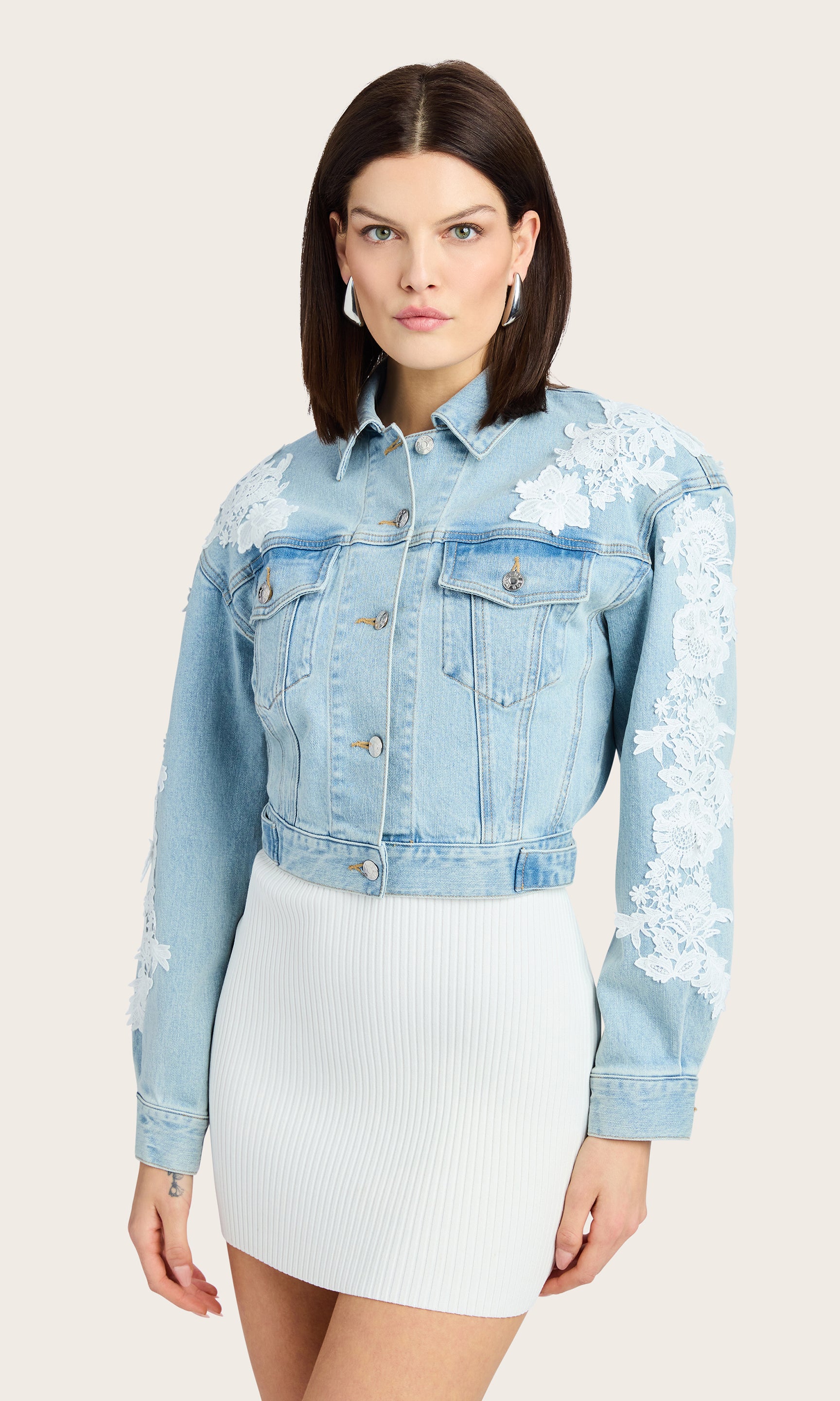 Front view of the Valex Lace Combo Denim Jacket styled with a white dress