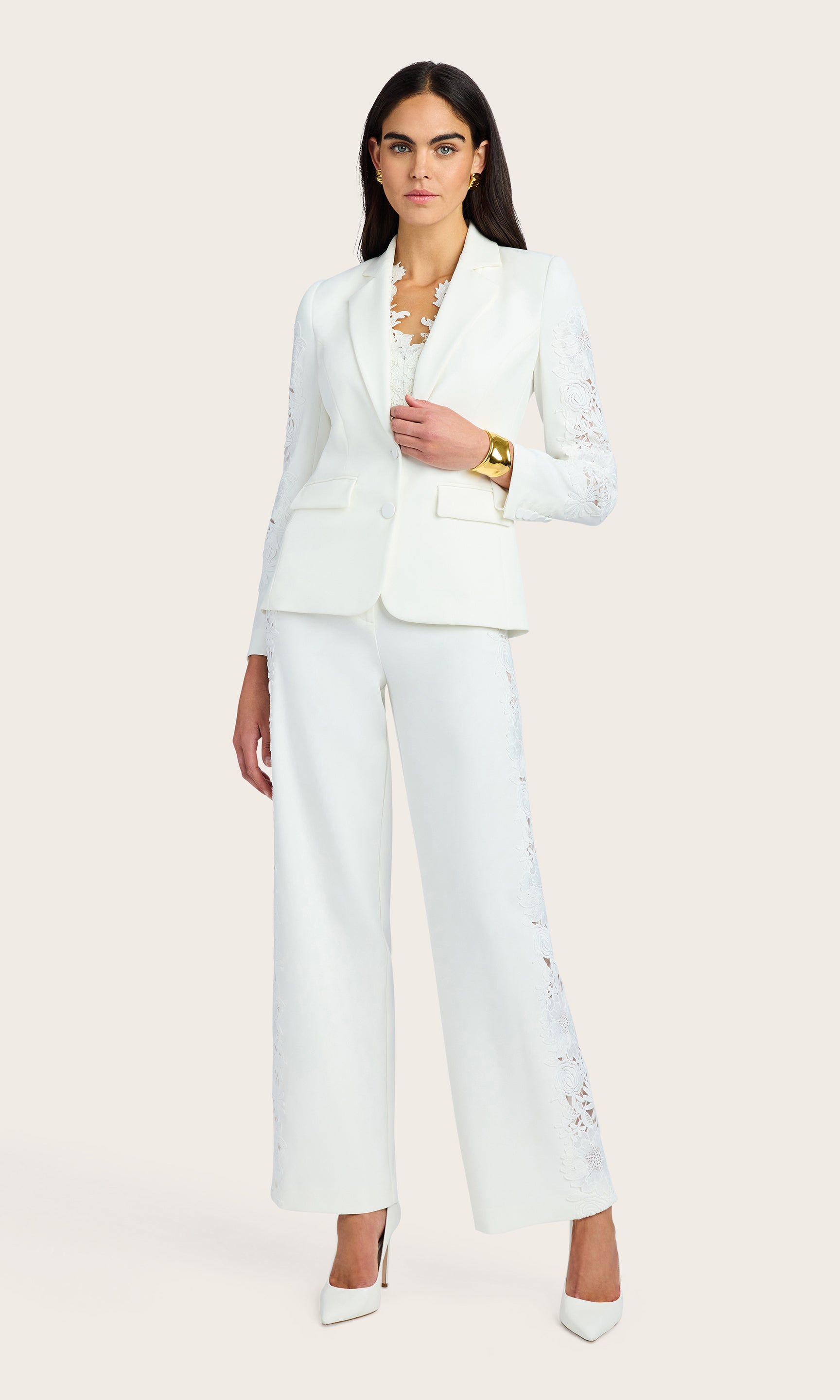 Full-body view of the model in the Venturi Lace Combo Blazer with coordinating white pants for a polished ensemble.