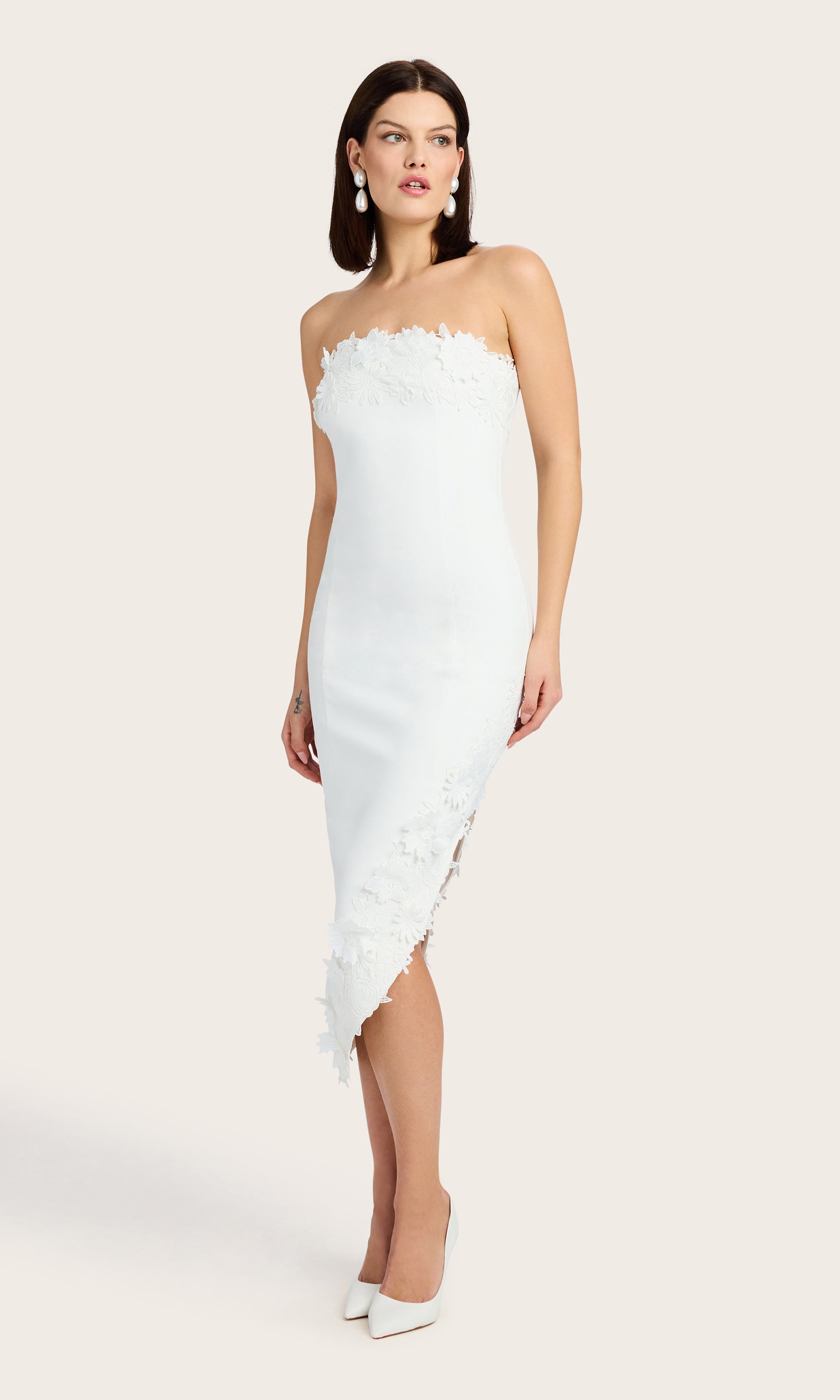 Side pose in the Zun Lace Combo Dress displaying the dress's movement and hemline.