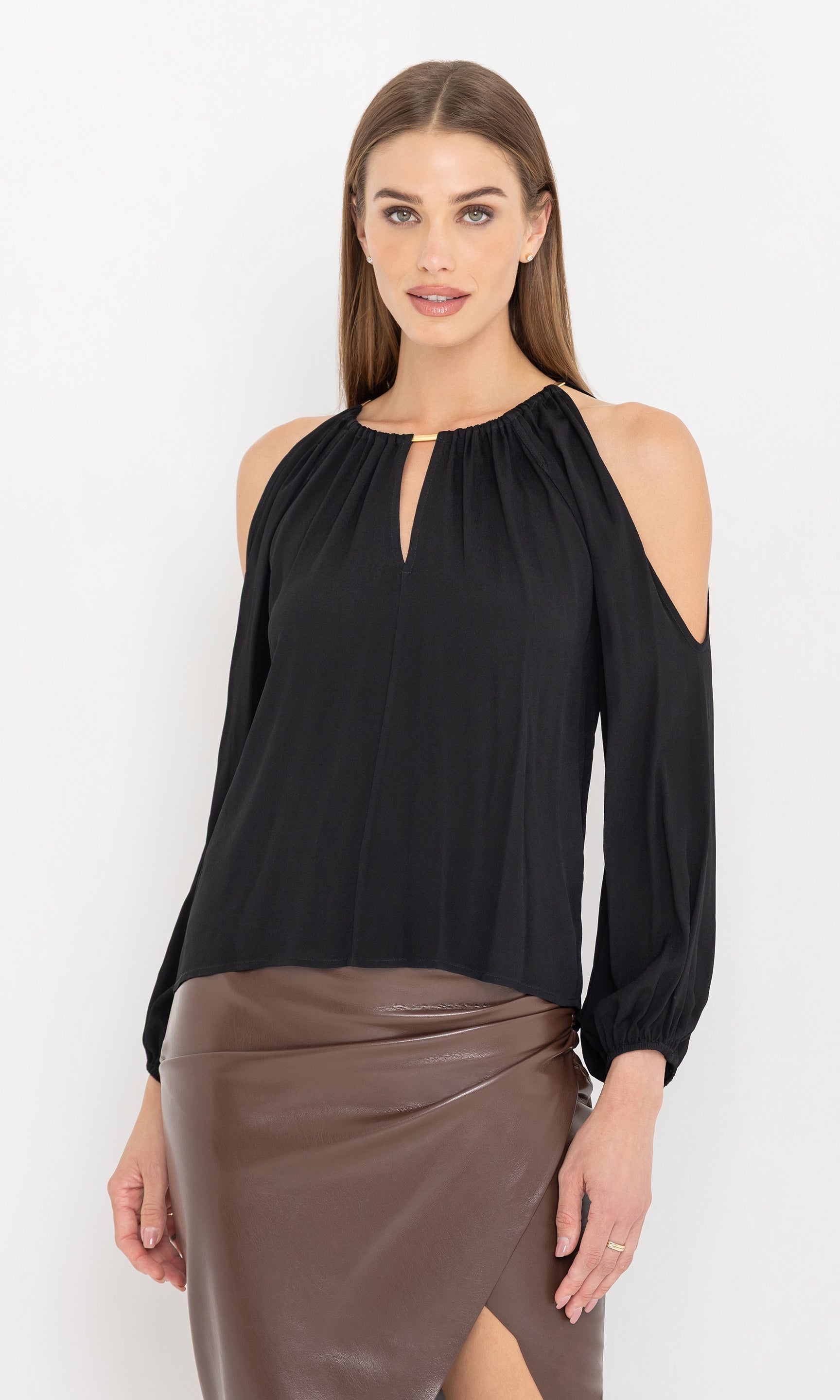 Three-quarter front view of the adara blouse emphasizing the blouson sleeves.