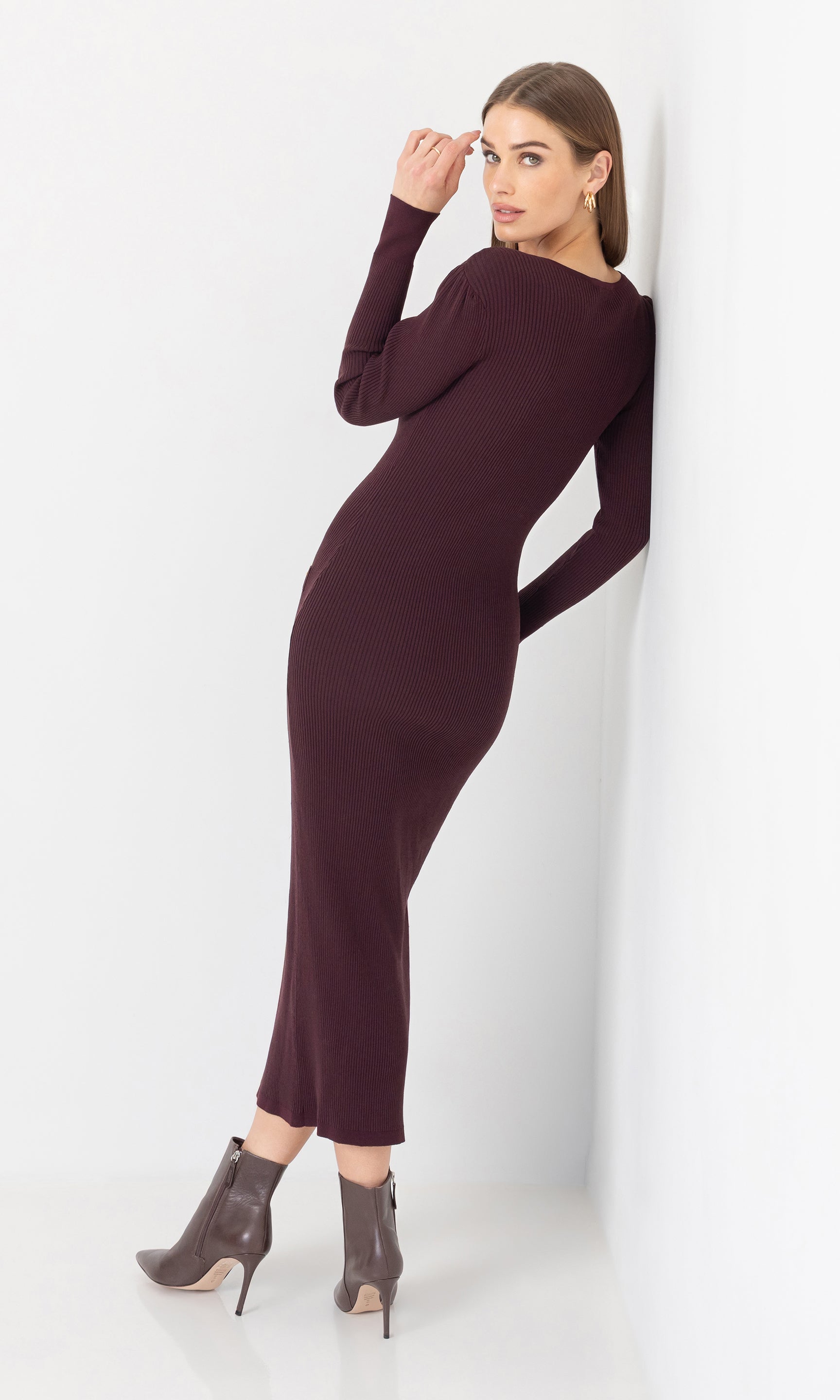 Side view of the andolina square neck dress showing the slim fit and long sleeves.