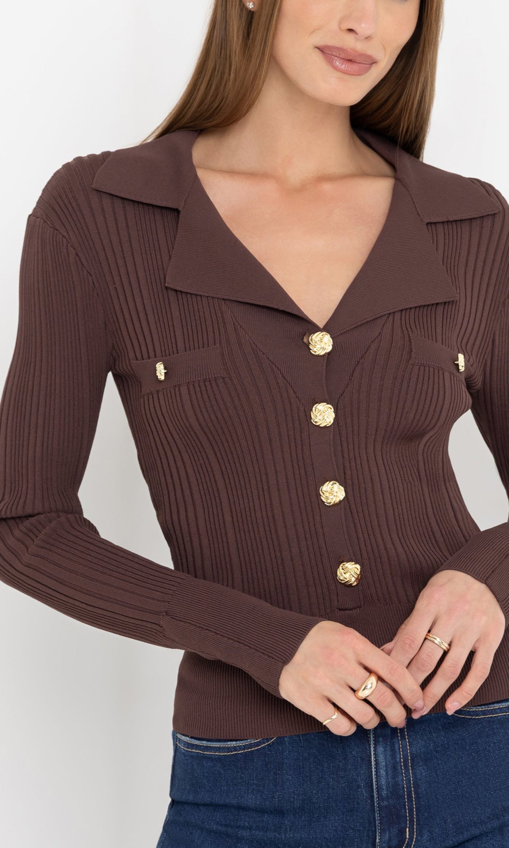 Close-up front view of the anira rib top highlighting the wide lapel collar.