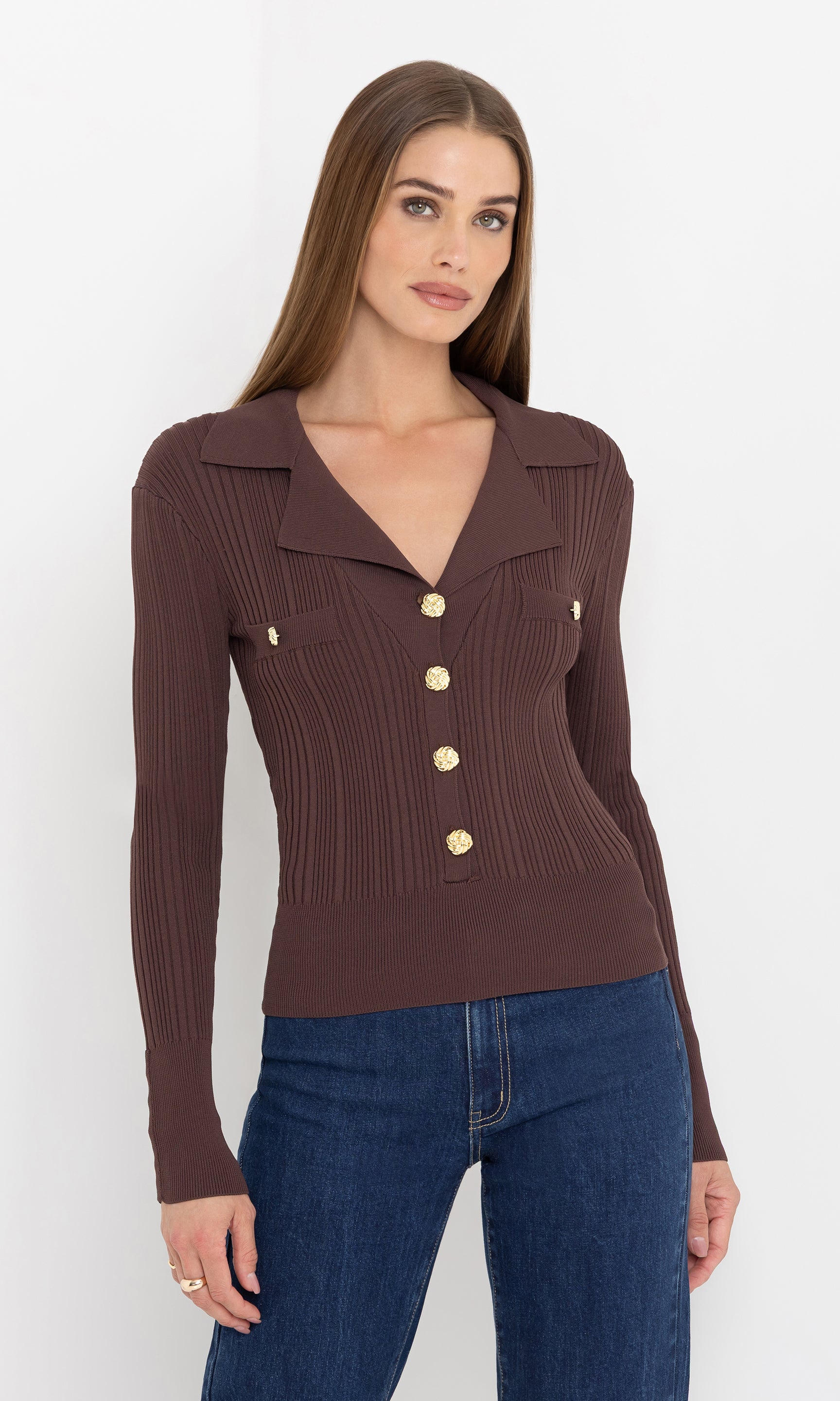 Front view of the model wearing the anira rib top with button detailing.