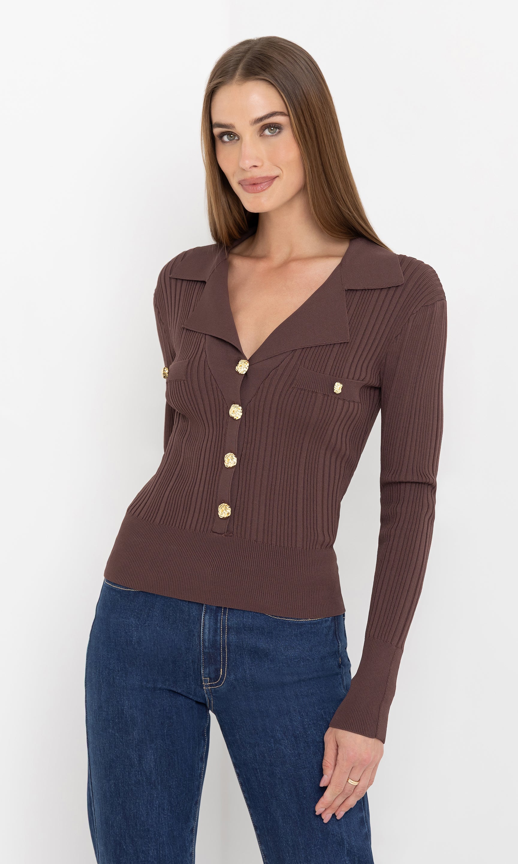 Three-quarter front view of the anira rib top emphasizing the slim silhouette.