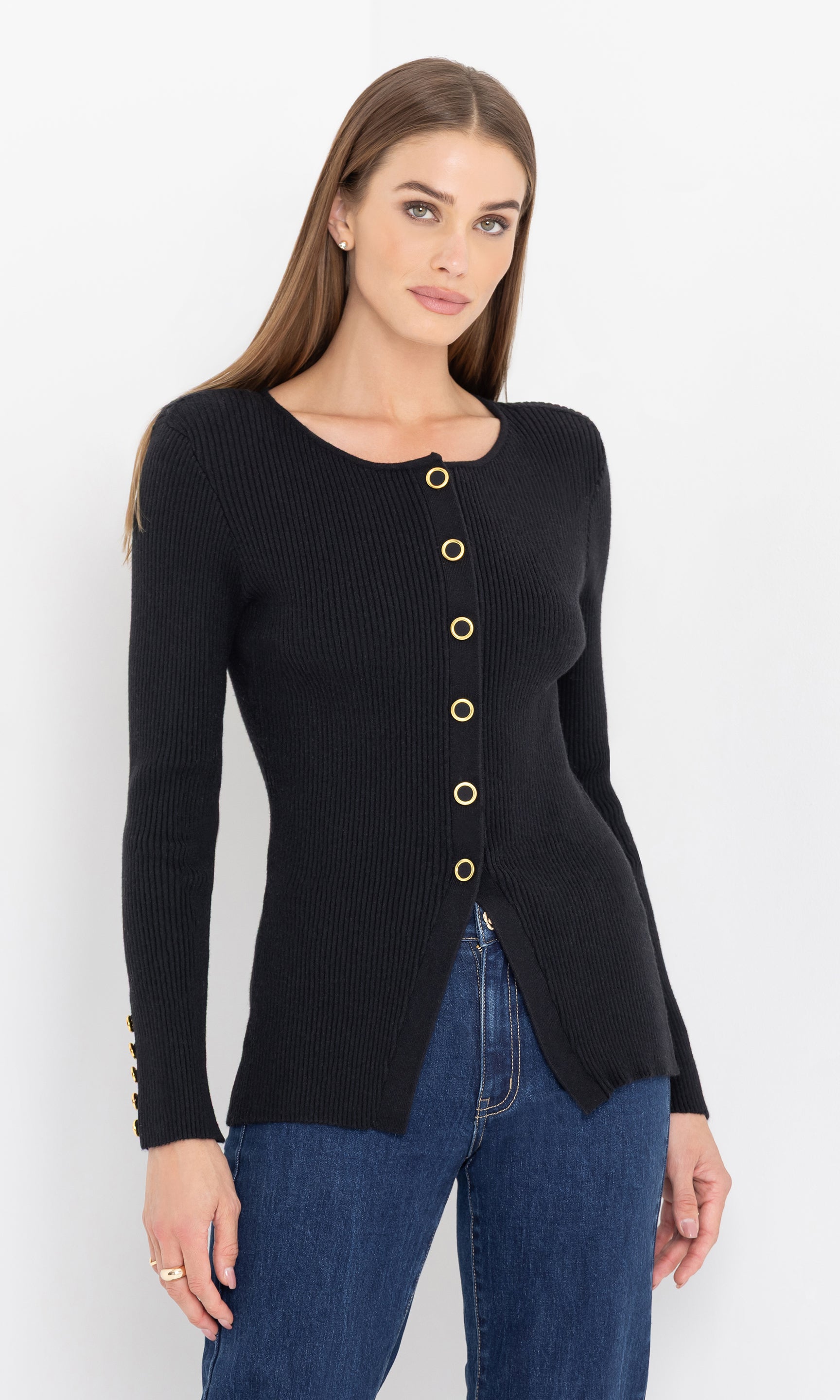 Front view of the model wearing the cherish rib cardigan with button detailing.