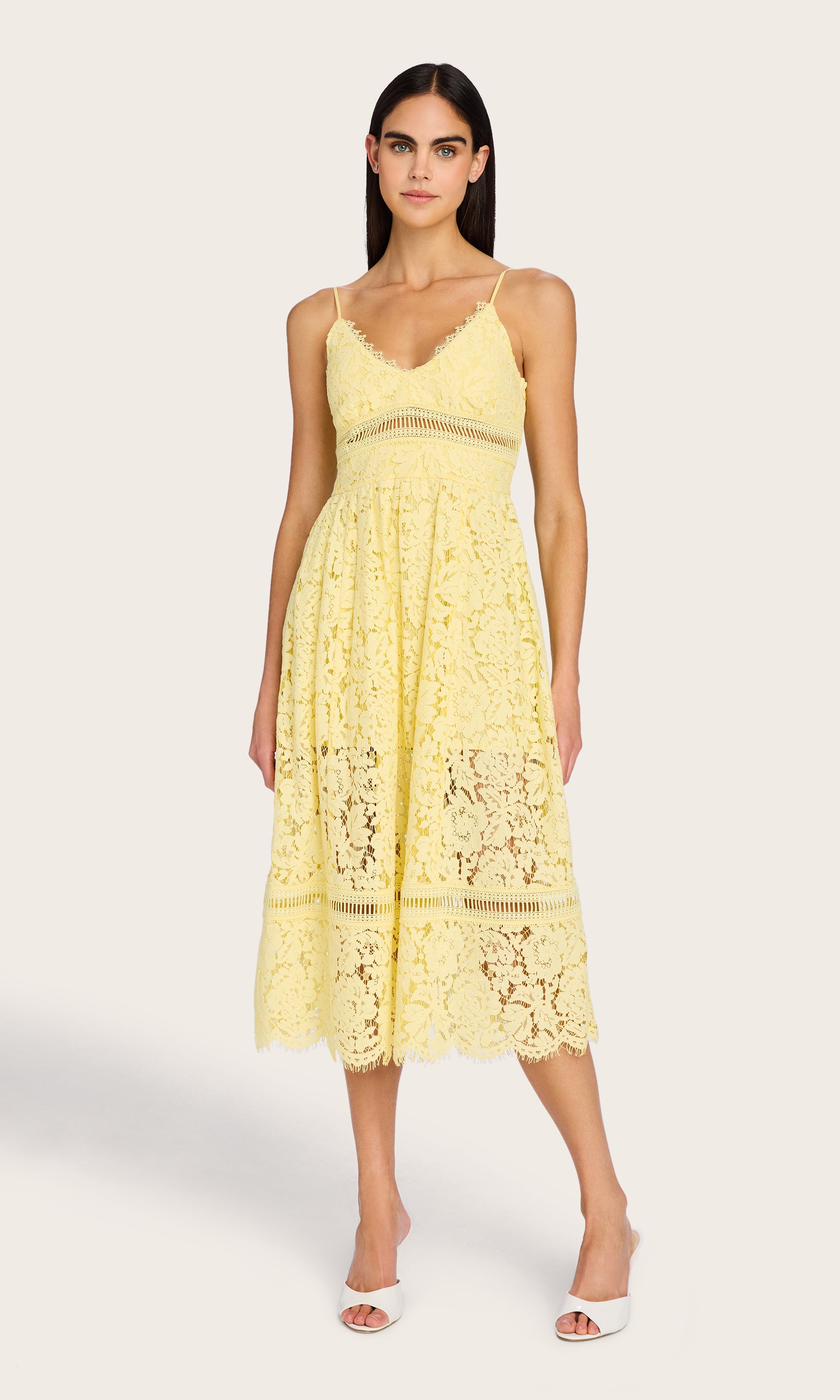 The model wears the Emma Lace Maxi Dress in a full-body front view, highlighting the ankle-length silhouette and lace design.