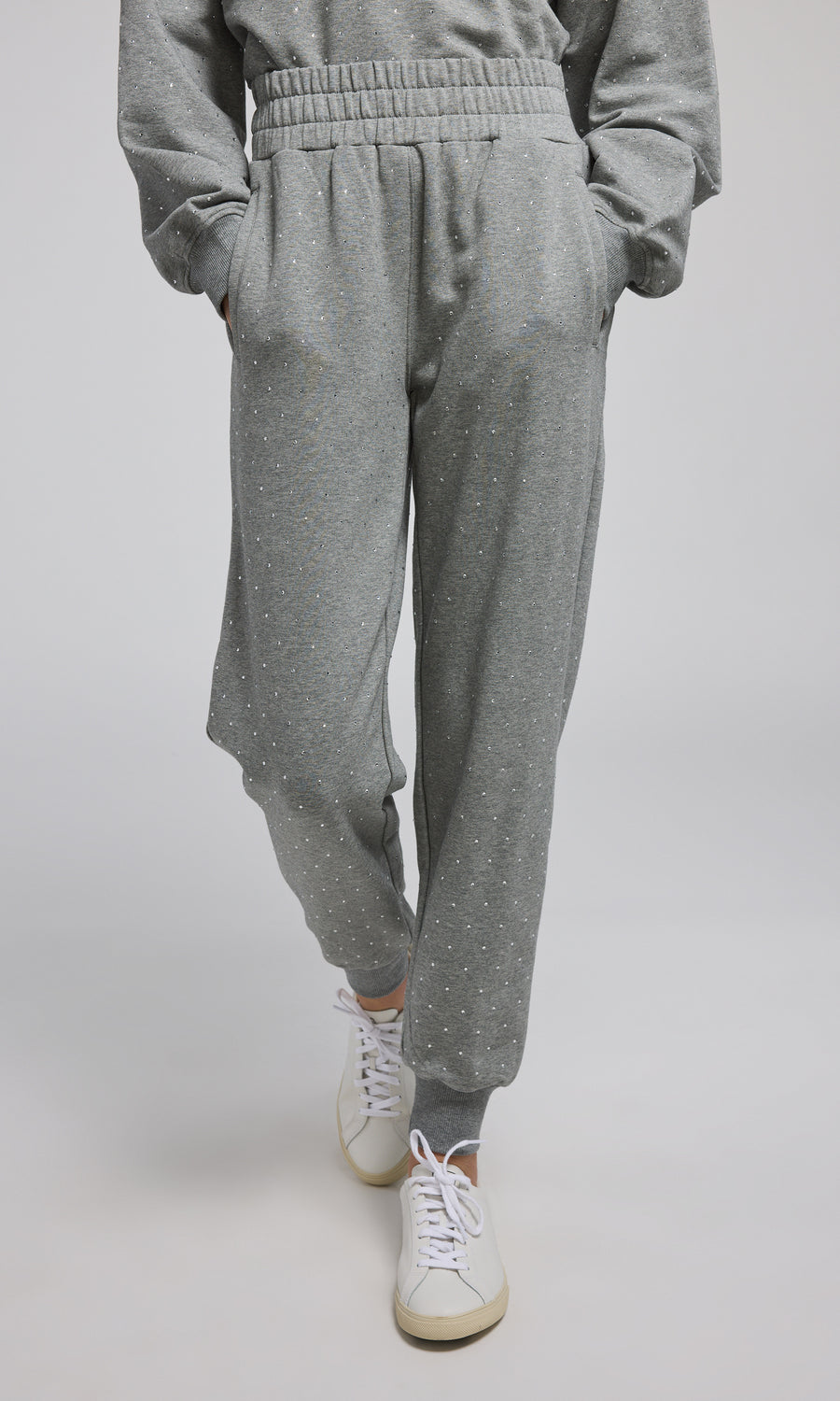 Comfortable grey crystal sweatpants made from a soft, stretchy material, ideal for casual and cozy looks.