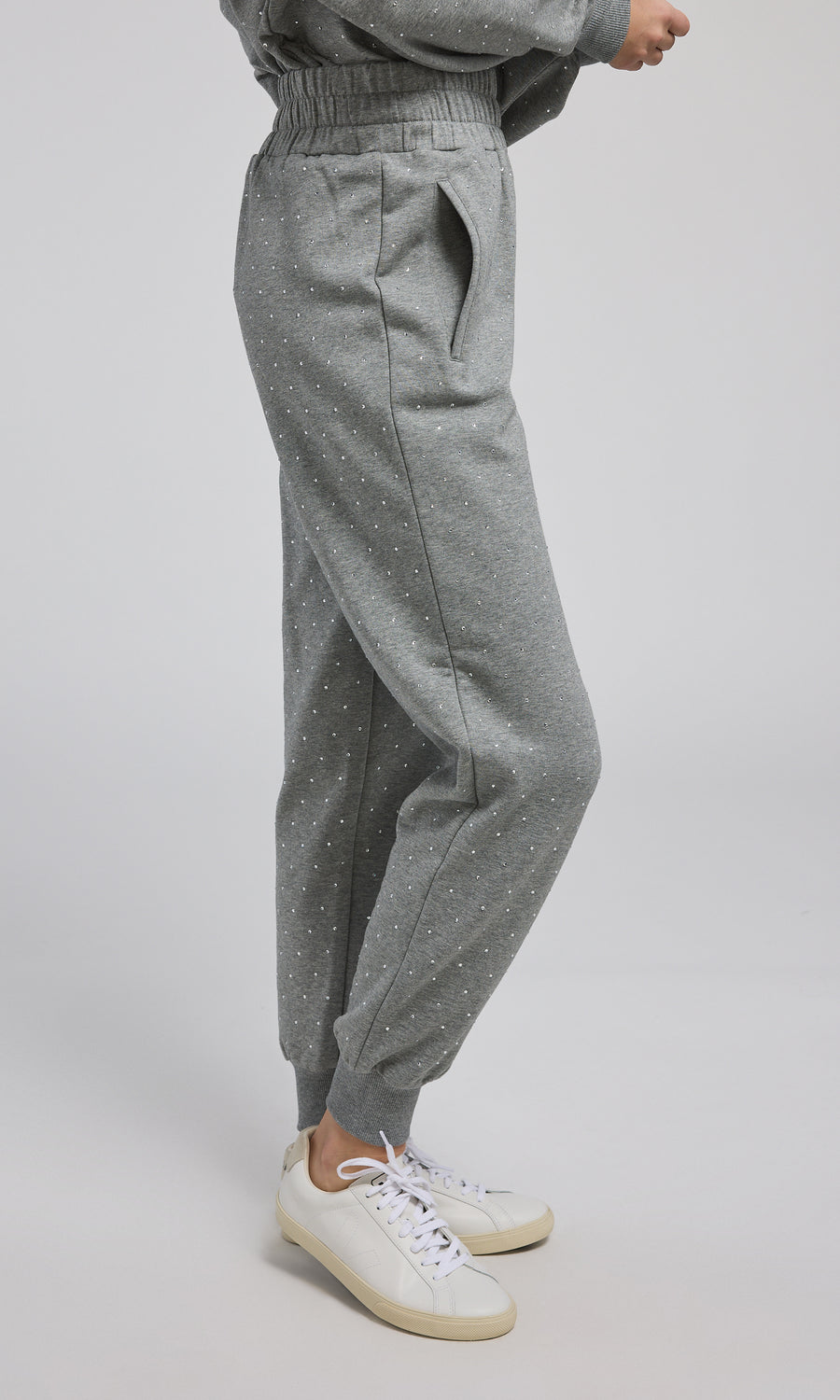 Comfortable grey crystal sweatpants made from a soft, stretchy material, ideal for casual and cozy looks.