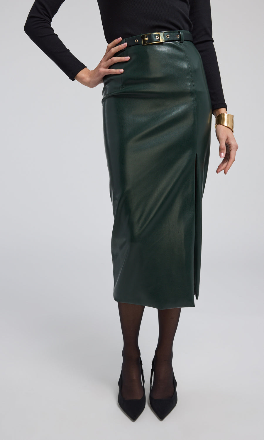 A chic vegan leather midi skirt, combining sophistication and a touch of sensuality in its design.