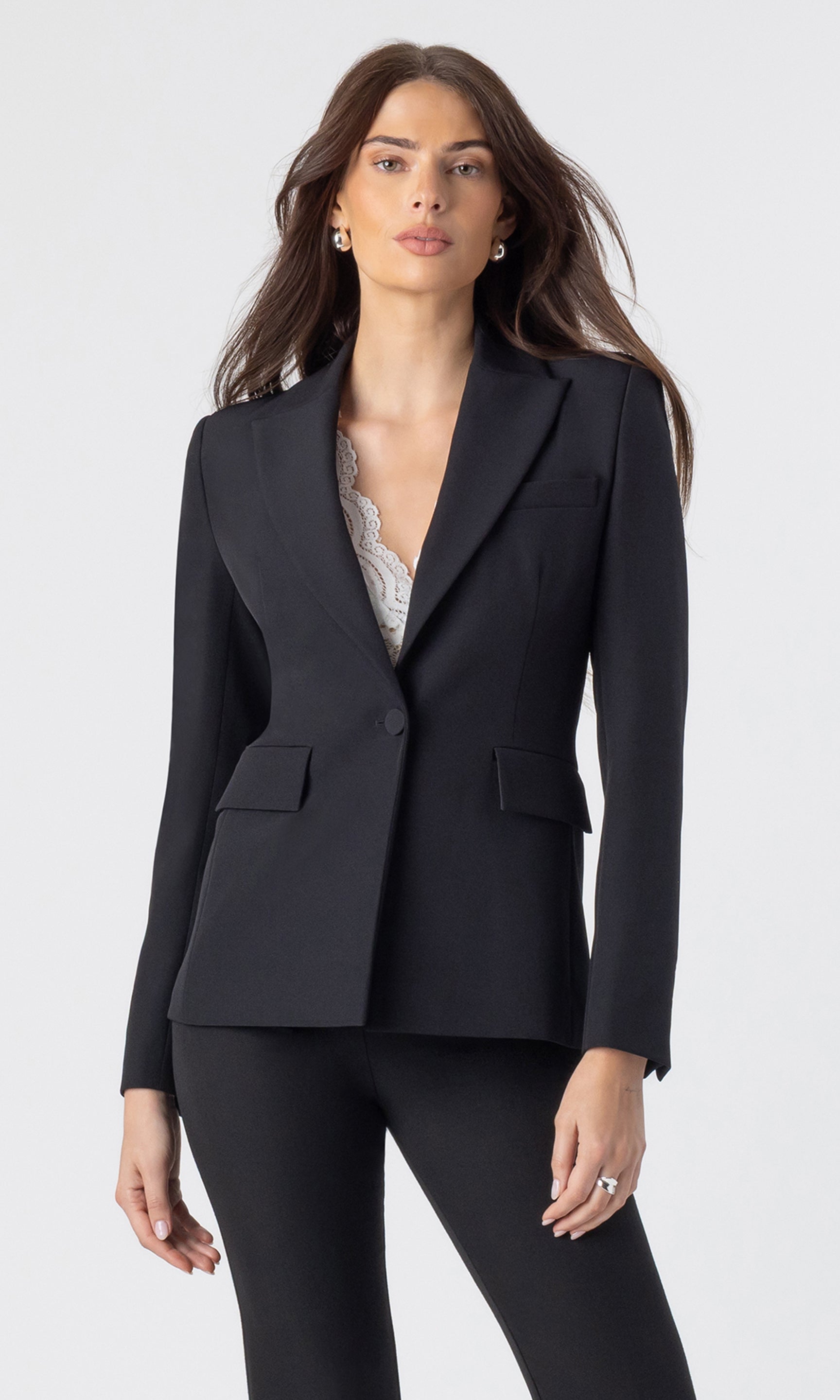 image of model wearing the Aimee crepe blazer in black with matching black trousers