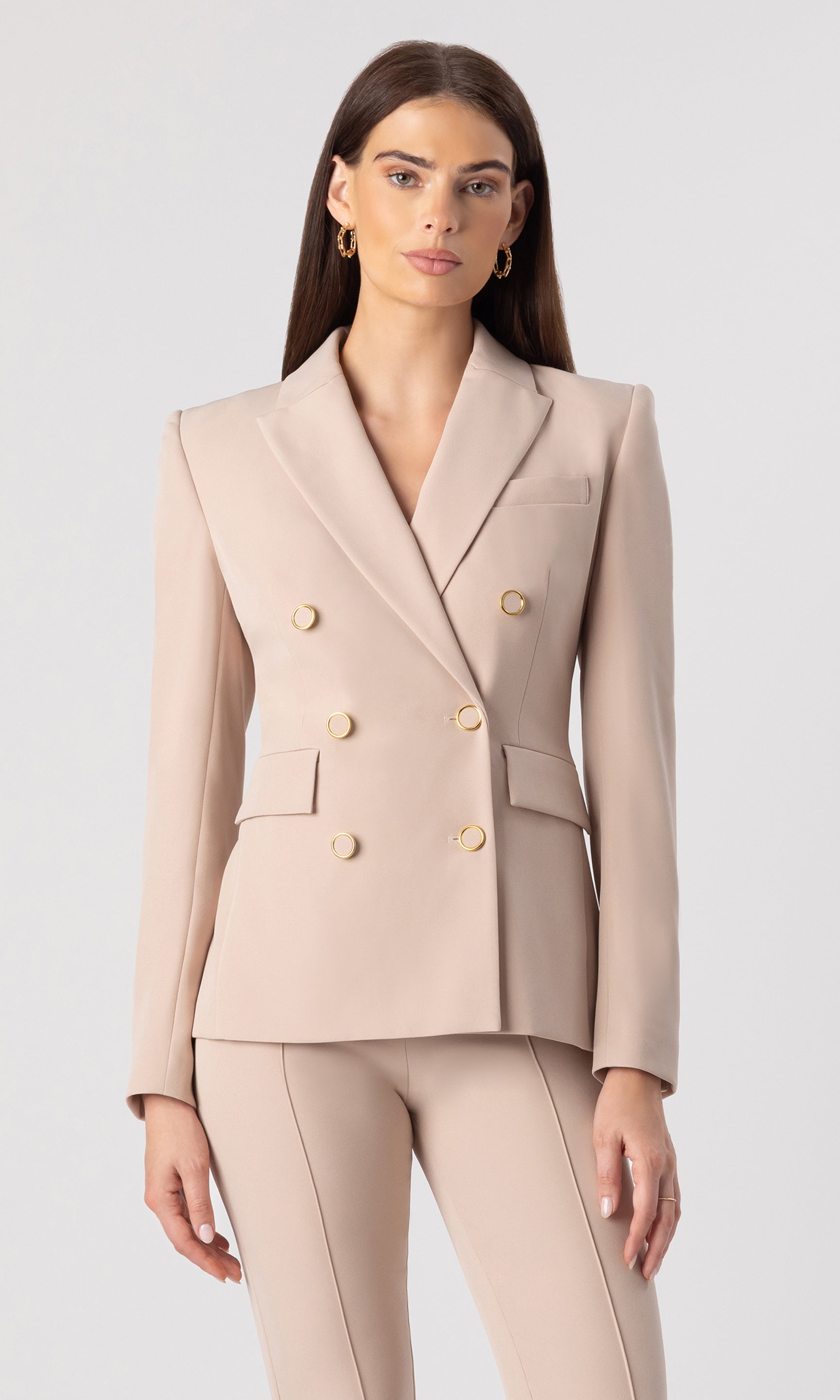 image of model wearing the Arielle crepe blazer in latte with matching latte trousers