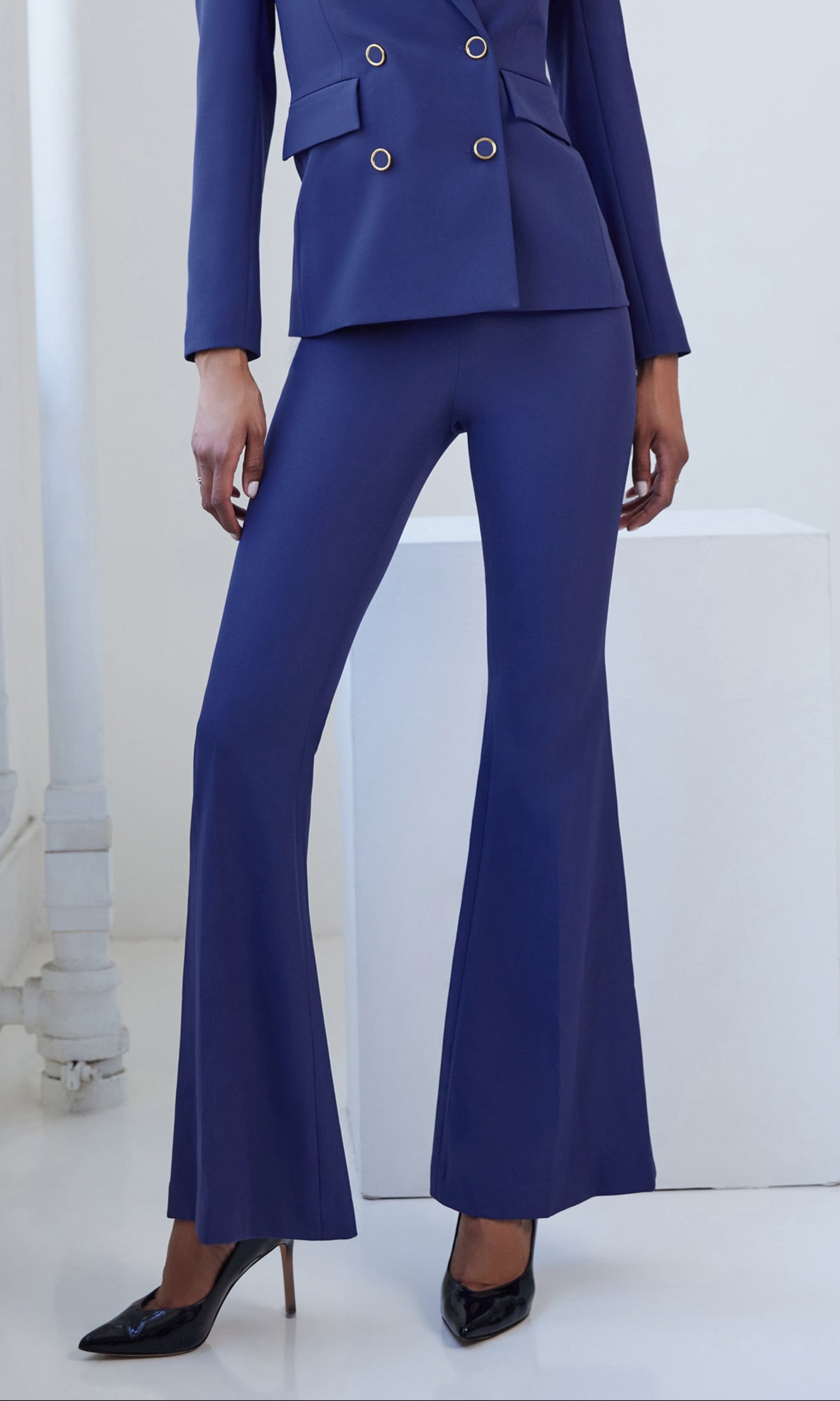 Close-up front view of the wesley crepe pants highlighting the flared leg.