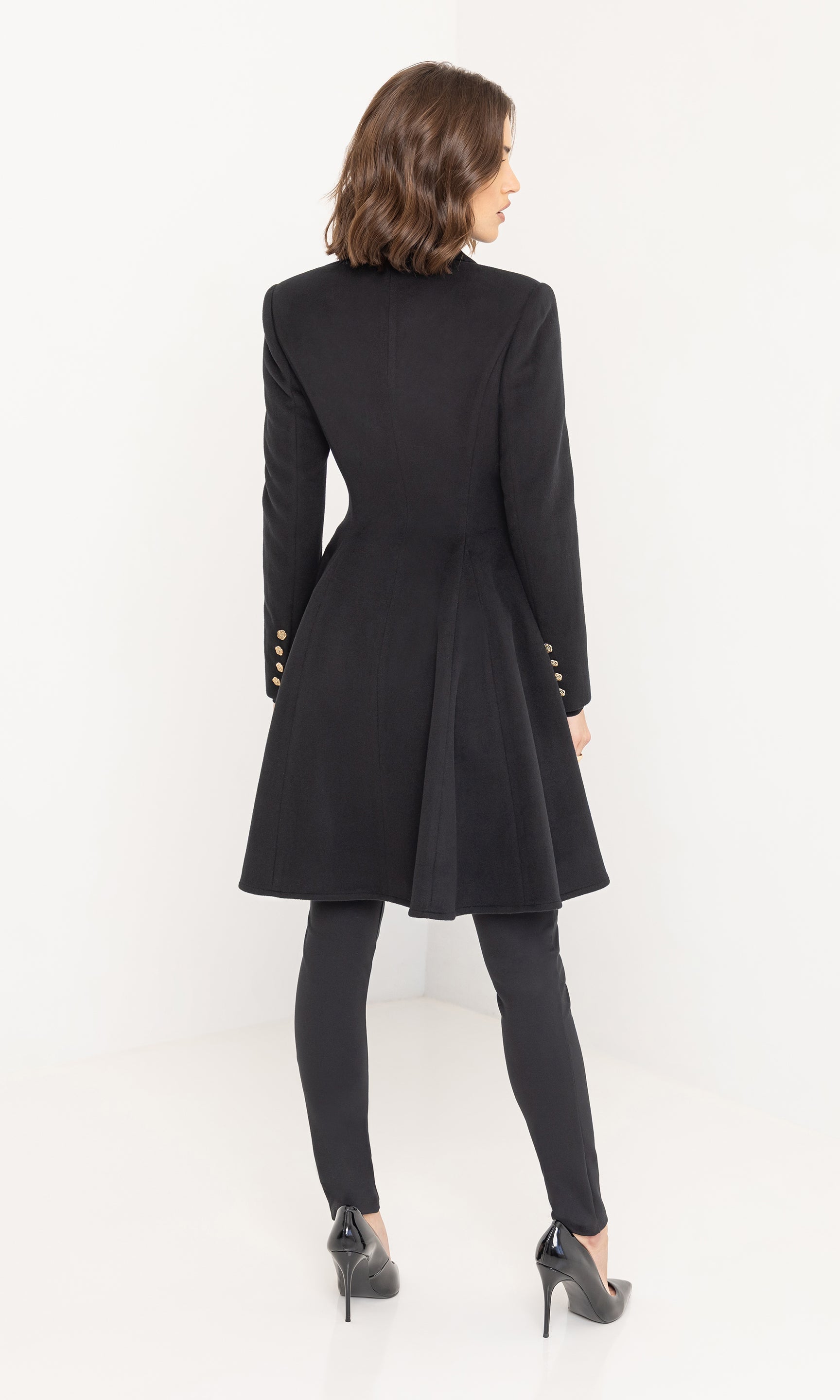 Rear view of the Judy Wool Coat showing its clean lines and structured silhouette.