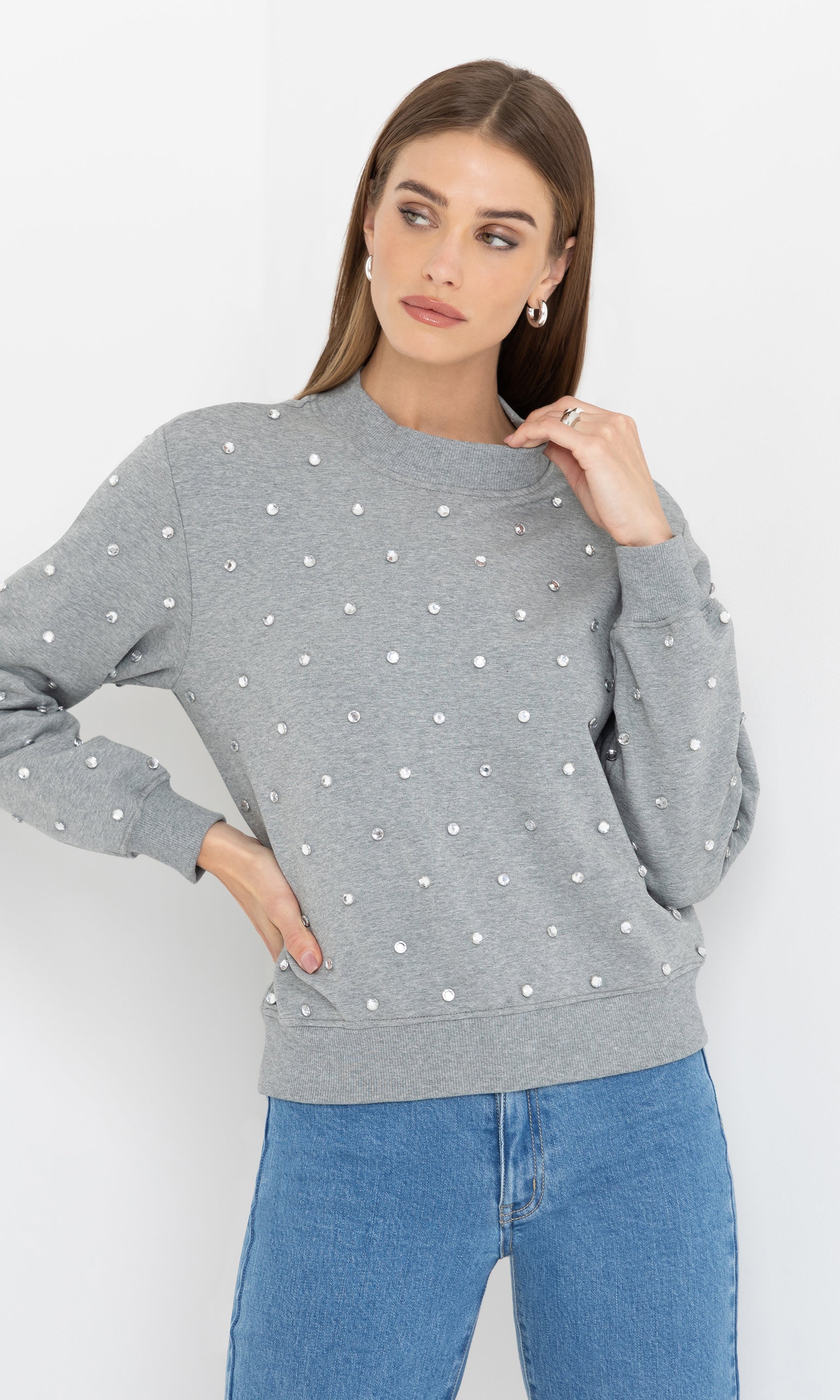 Front view of the Julie Crystal Stud Sweatshirt in heather grey, showcasing its relaxed fit and shimmering crystal embellishments.