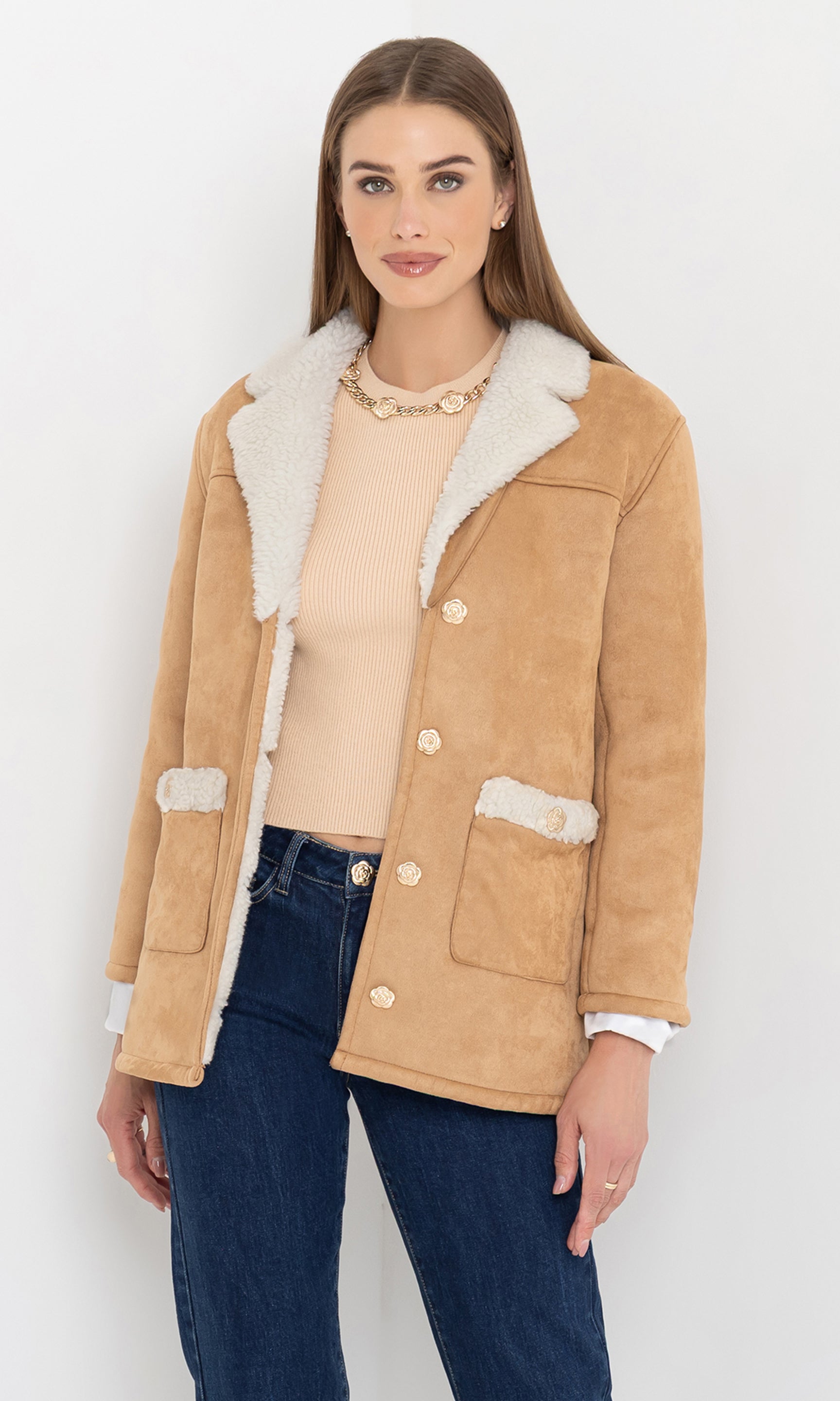 Three-quarter front view of the luvia faux shearling jacket emphasizing the shearling trim.