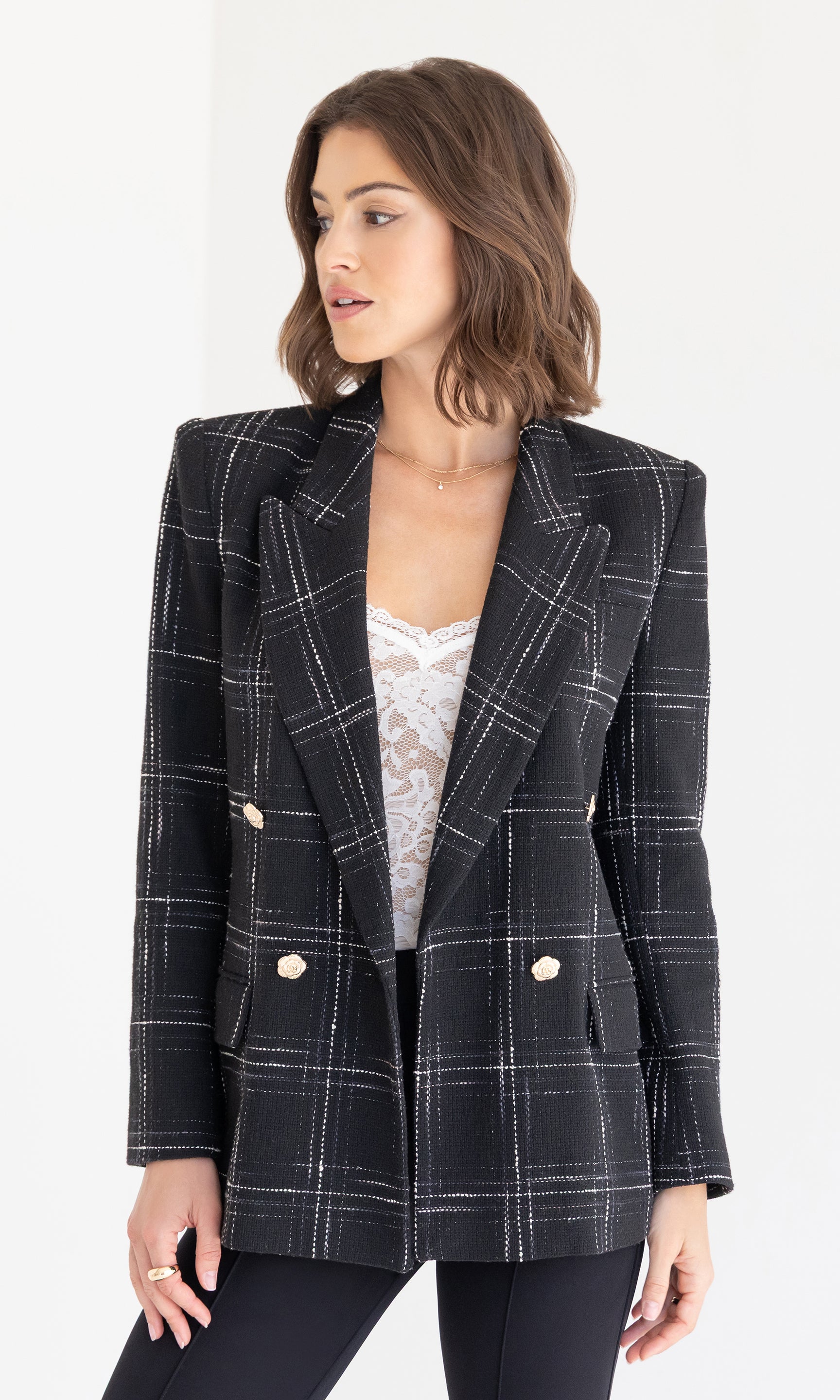 Side angle view of the Maverick Windowpane Tweed Blazer showing its tailored fit and double-breasted design.