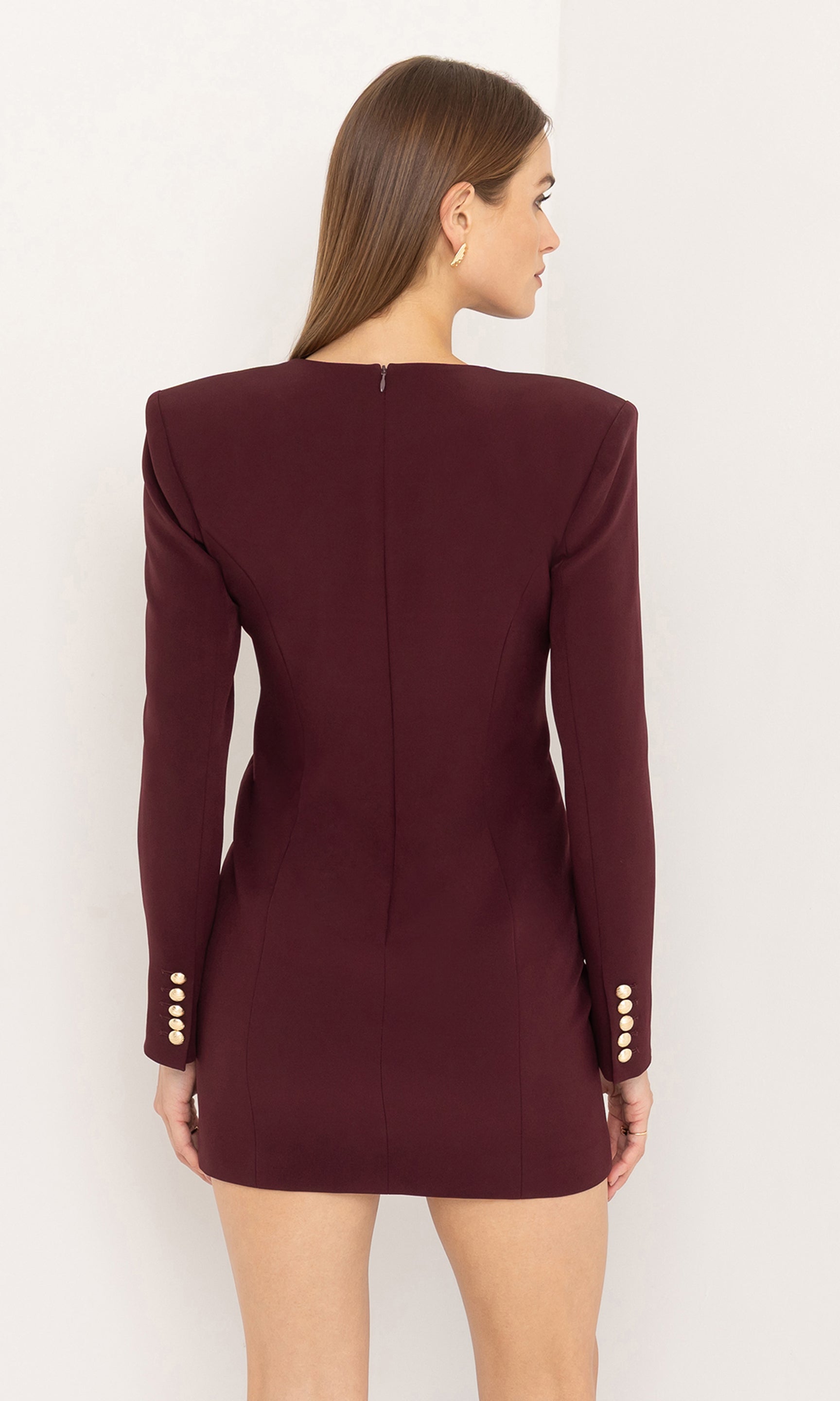 Rare view of the Mellie Crepe Dress showcasing the structured shoulders and tailored fit.