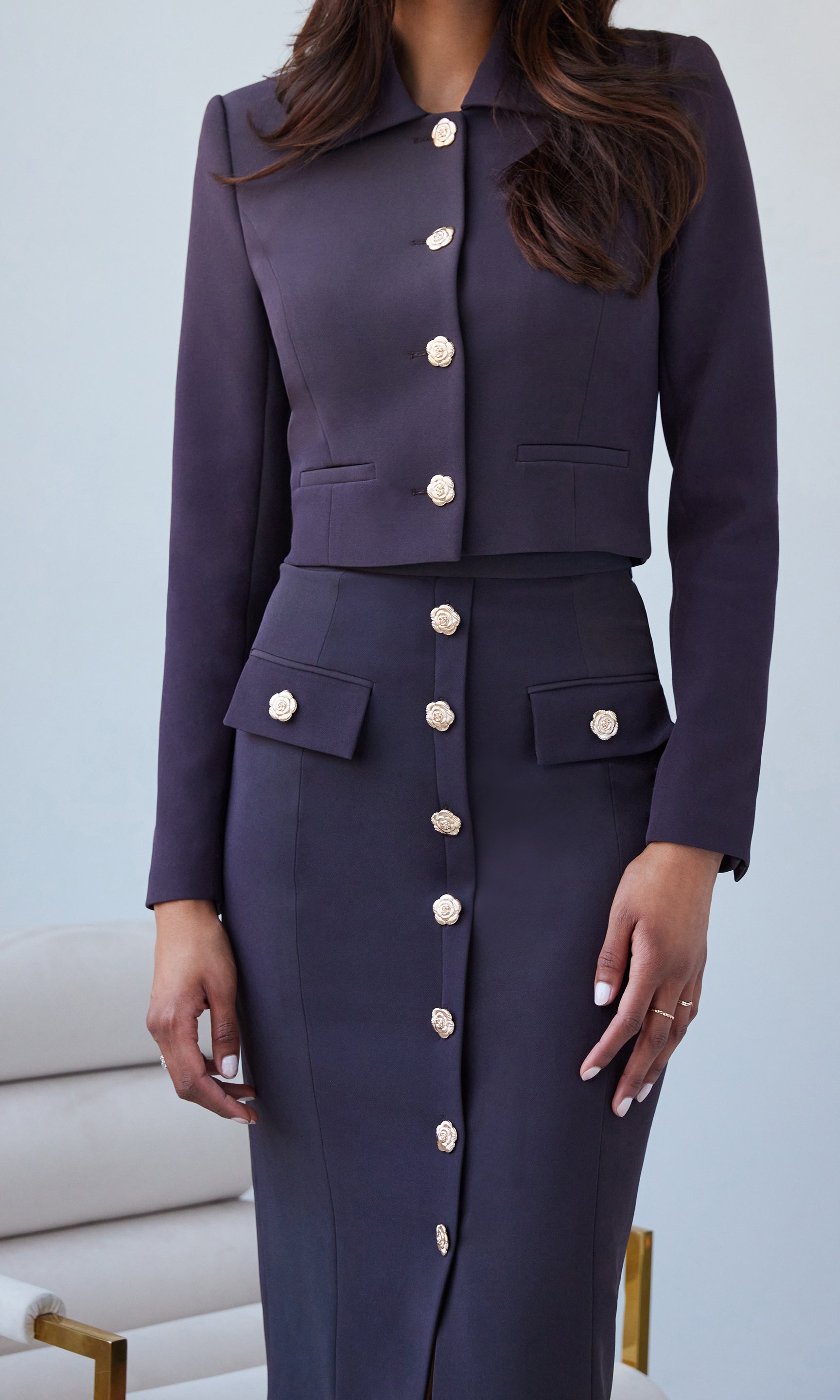 Close-up view of the oliver crepe jacket, highlighting the structured fit and oversized buttons.
