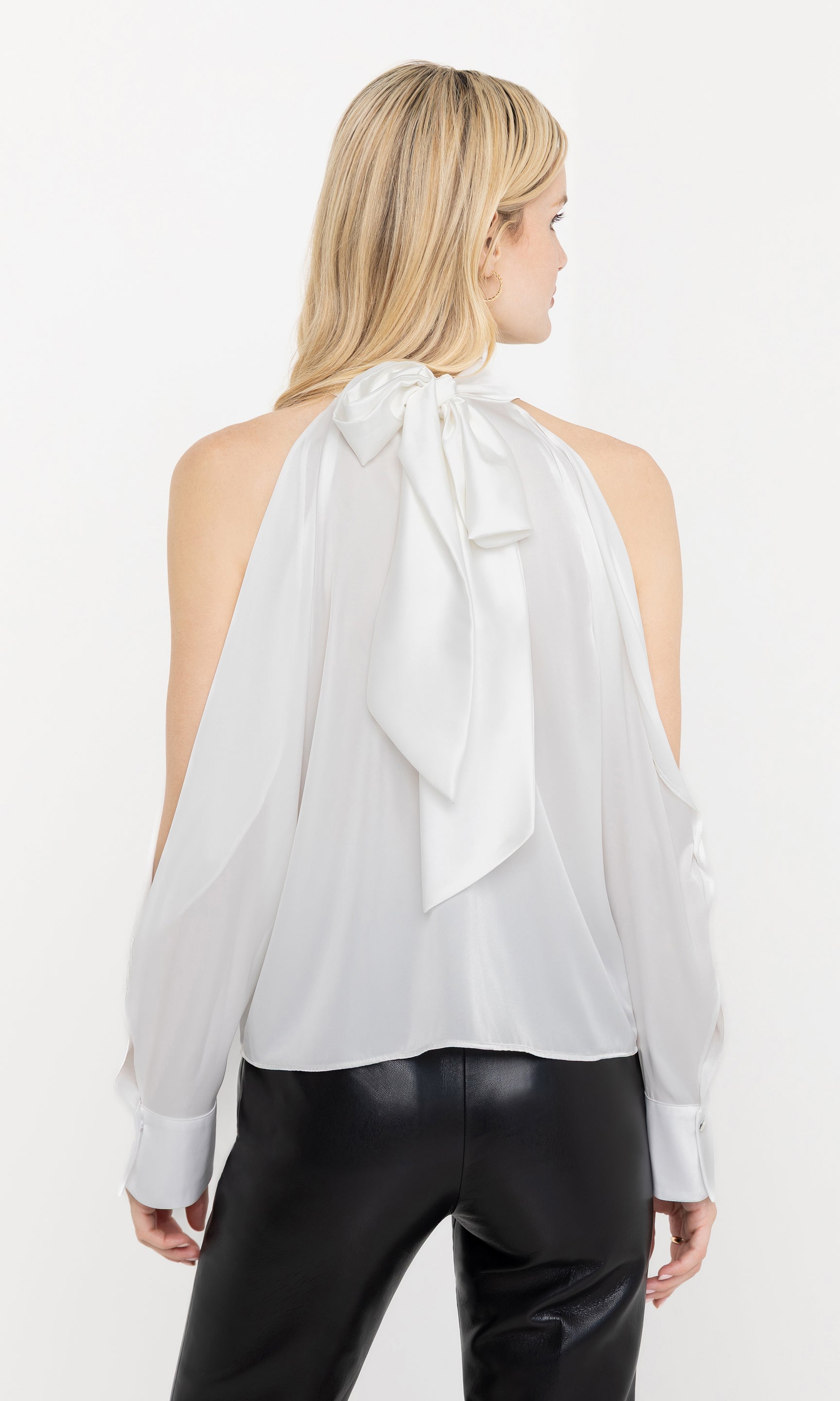 Rear view of Rossi Halter Blouse in white, showcasing the halter neckline and open shoulder design.