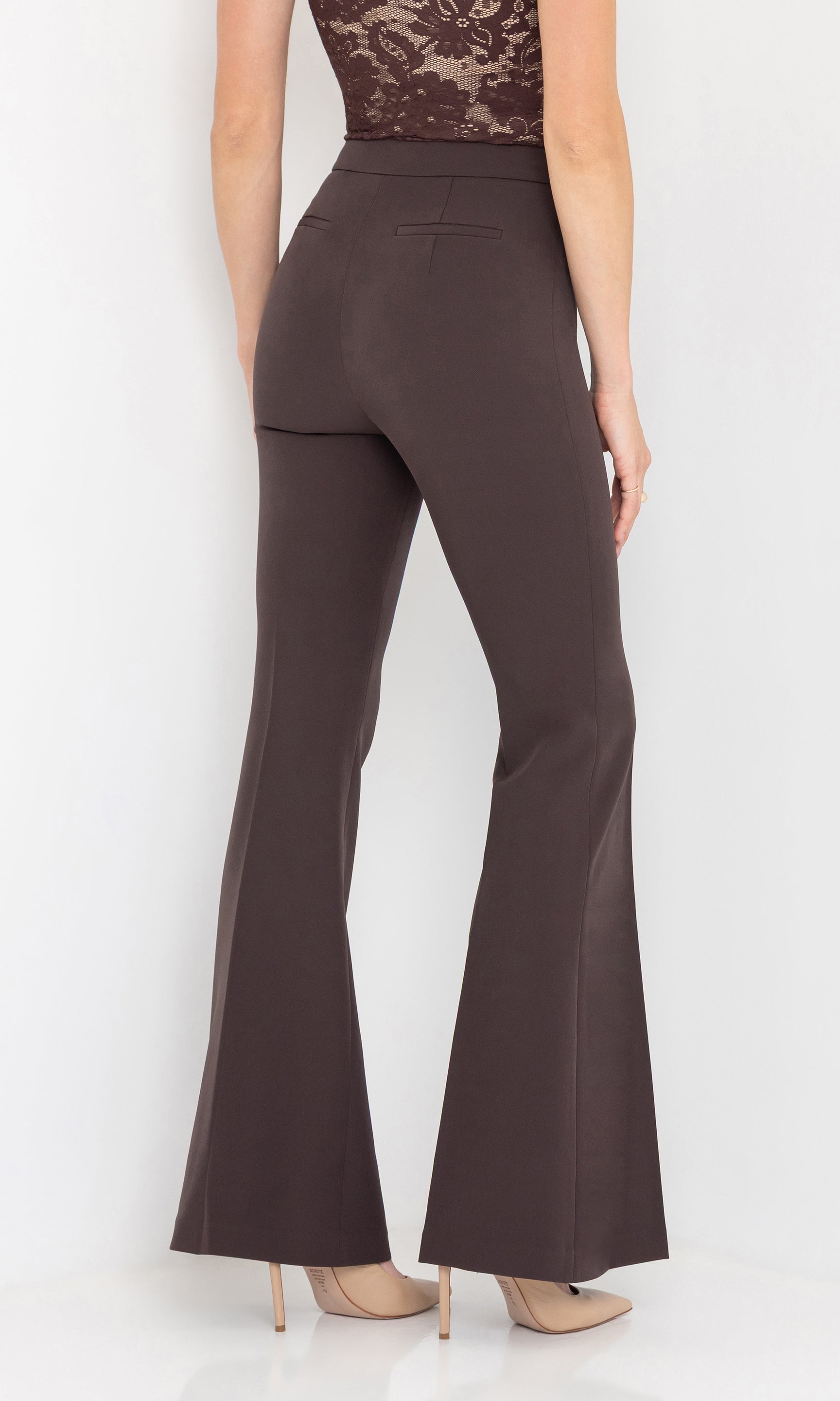 Side view of the wesley crepe pants showing the flared silhouette.