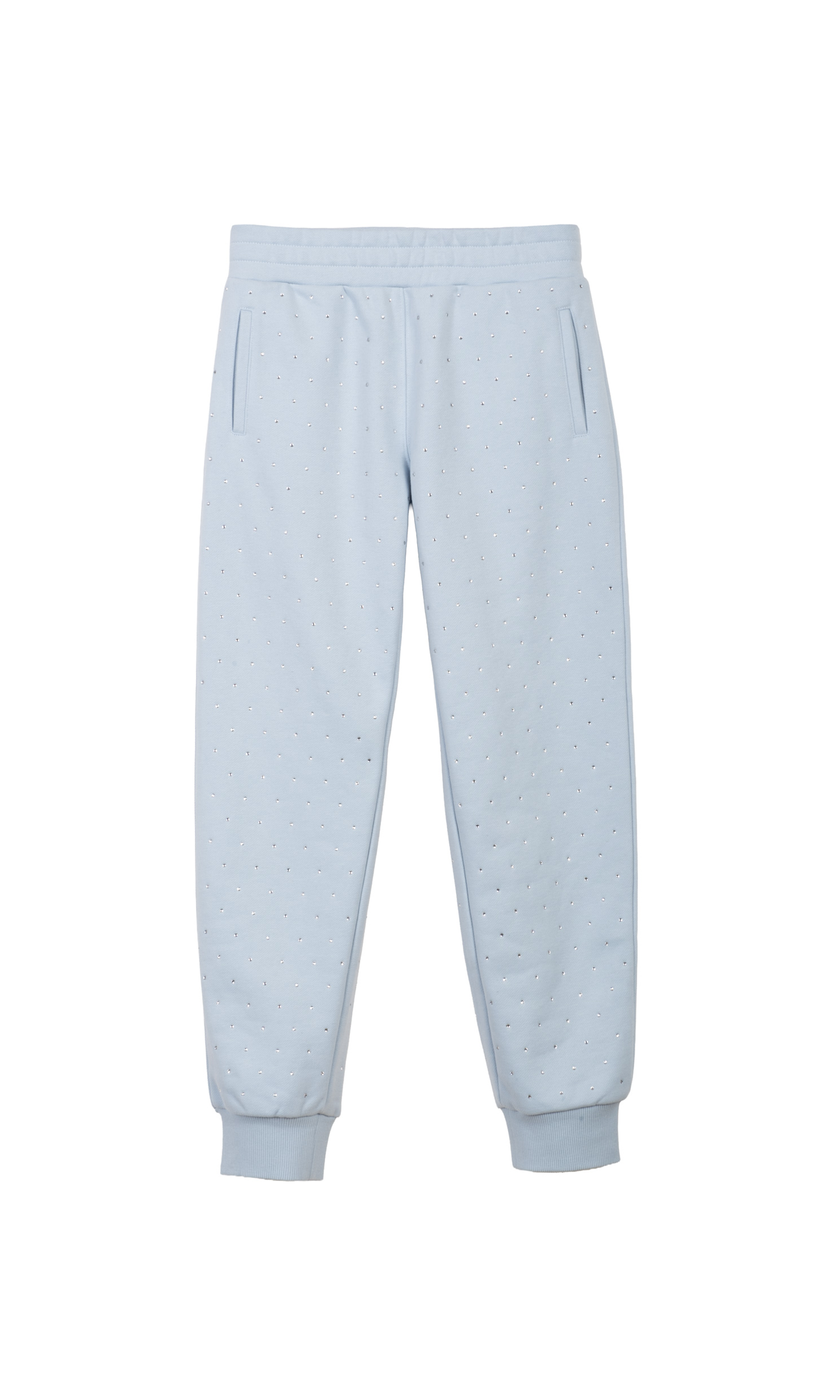 Light blue sweatpants with crystal embellishments on a white background