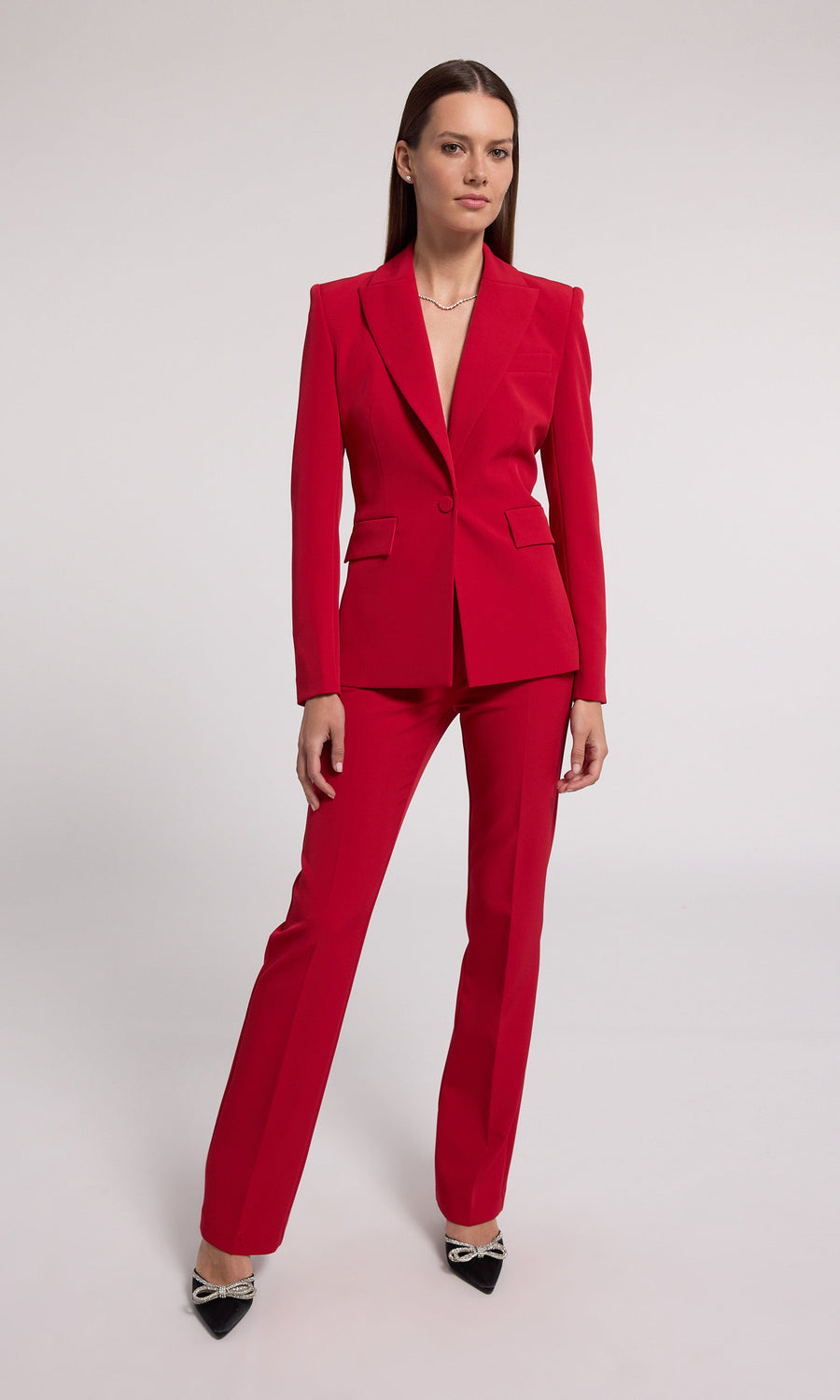 This red blazer is an ideal selection for any occasion, offering a classic look that complements various styles effortlessly.