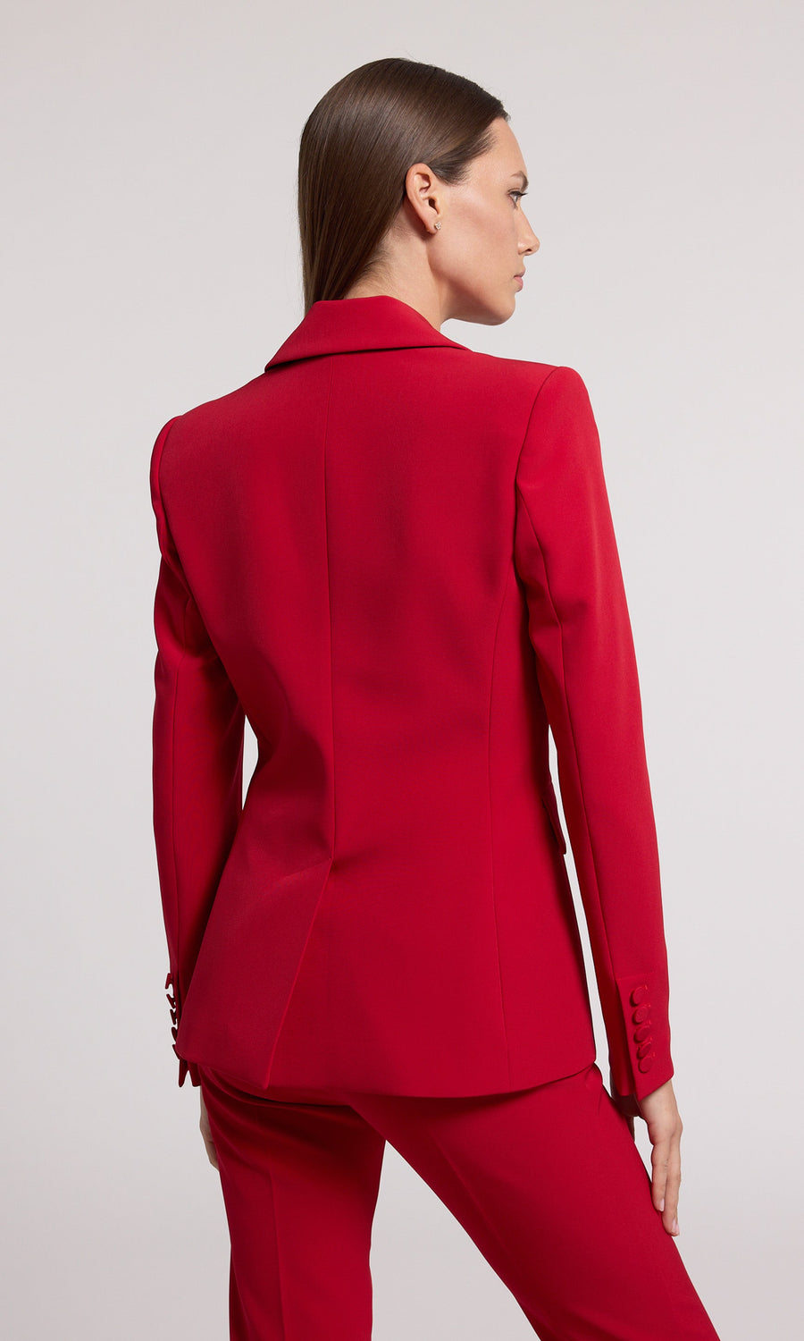 This red blazer is an ideal selection for any occasion, offering a classic look that complements various styles effortlessly.