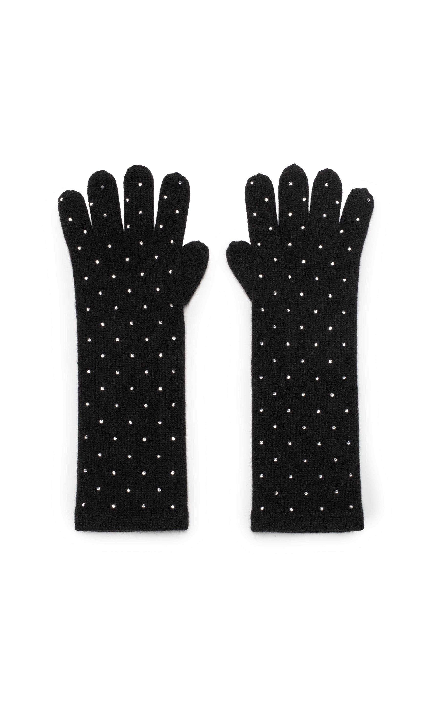 Pair of black gloves with white polka dots on a white background