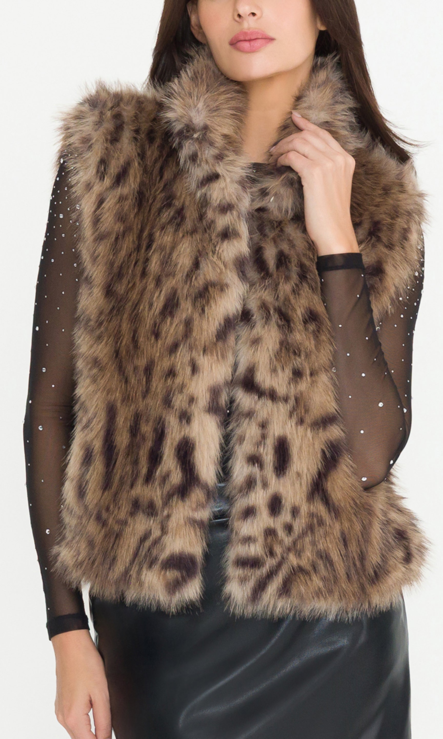 Leopard print fur vest worn by a model, showcasing the animal print and faux fur detail