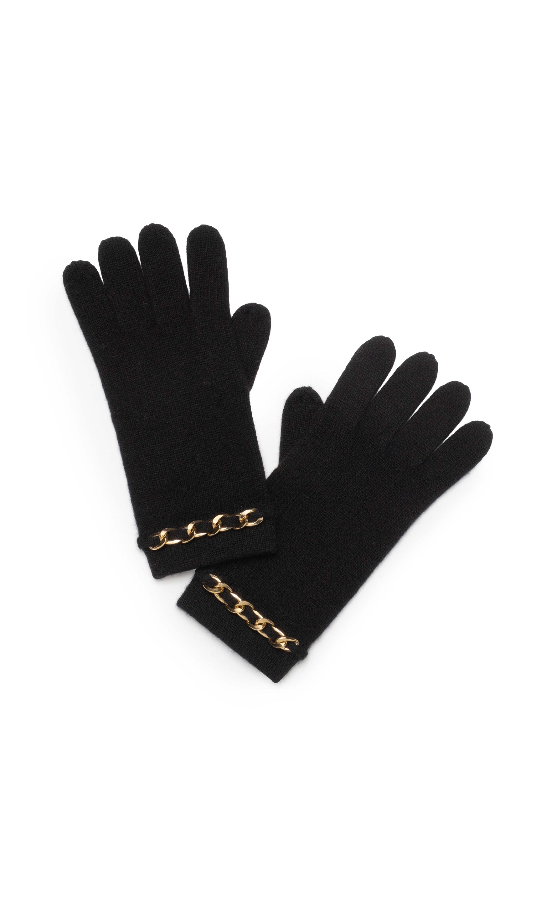 Black gloves with gold chain details on a white background