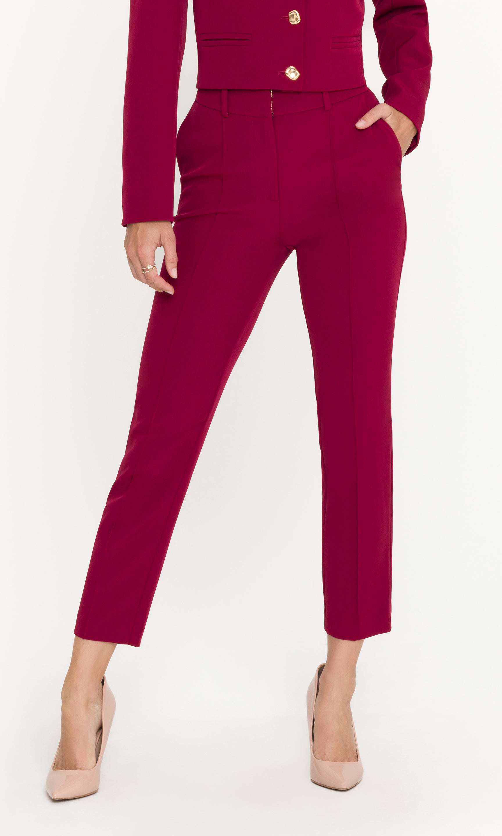 Red suit with matching pants on a white background