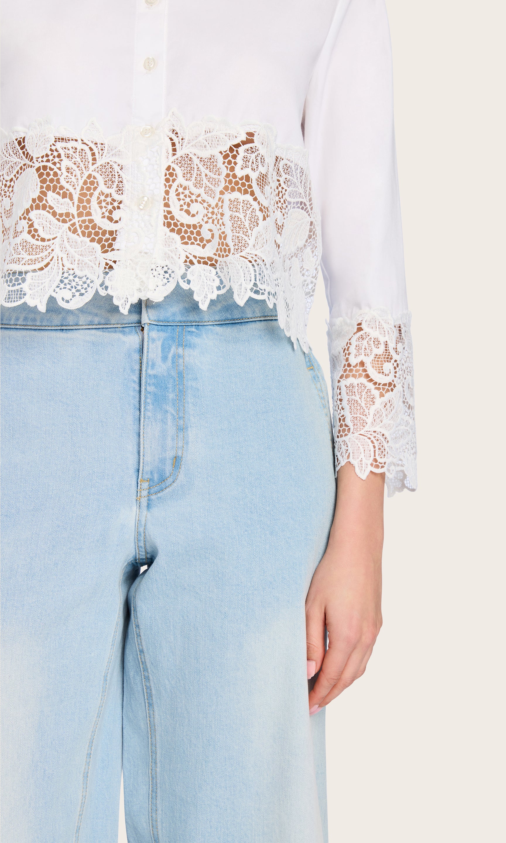 Close-up front view of the Issa Lace Combo Shirt, focusing on the lace paneling and crisp white button-down collar.