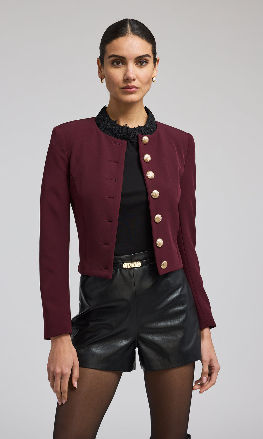 A striking malbec jacket with front buttons, highlighting a chic and fashionable outerwear choice.