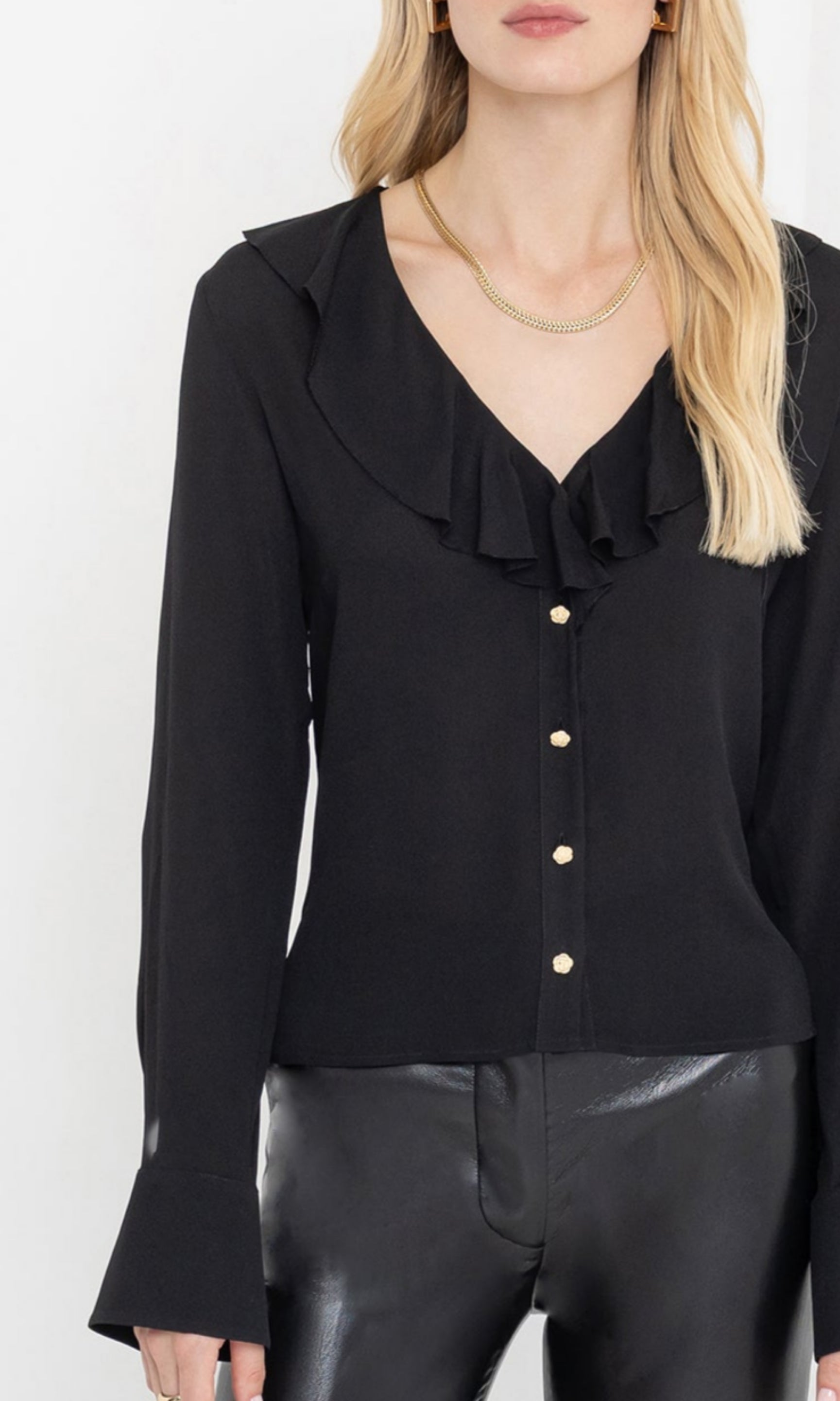 Close-up front view of the kassy blouse highlighting the button details.