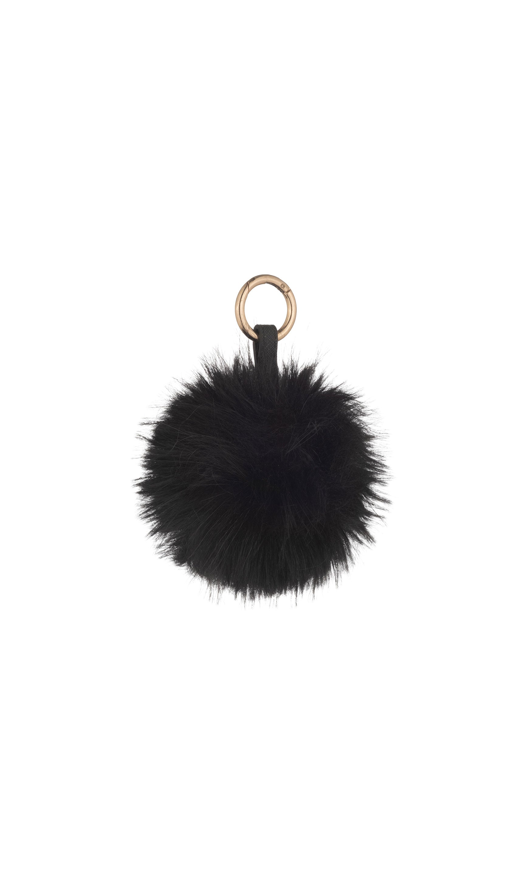 Black fluffy keychain with a gold ring on a white background