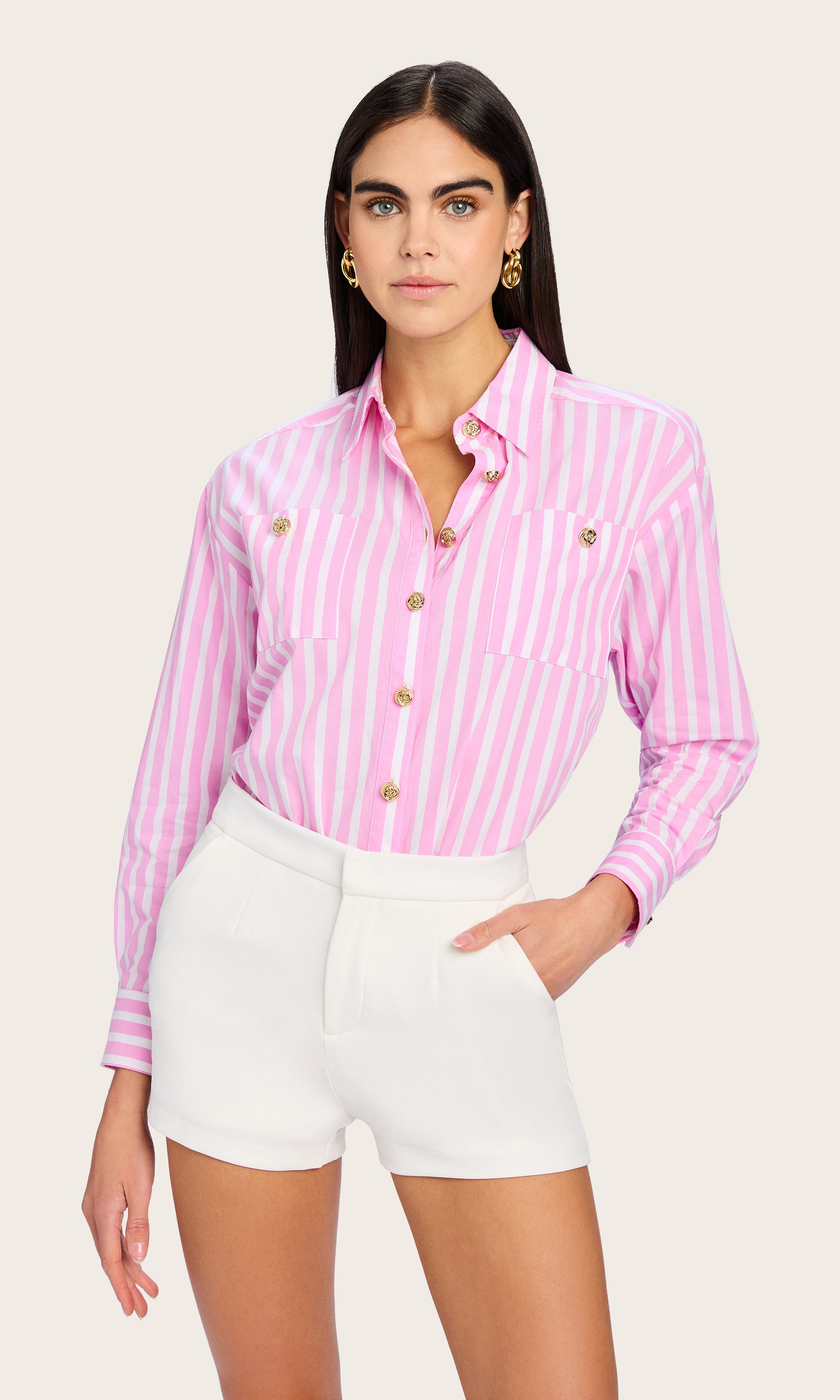 Another front view of the Meggy Wide Stripe Poplin Shirt styled casually, with the model posing confidently