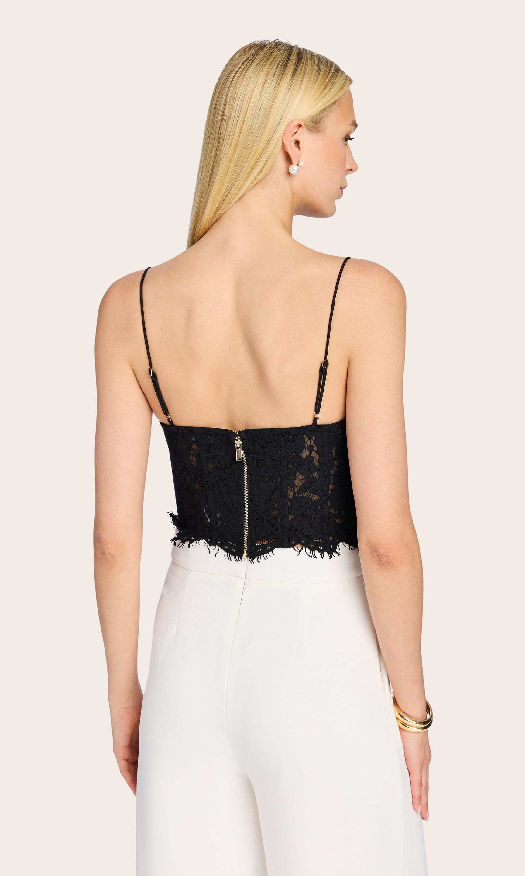 Rear view of the Miami Lace Bustier showing the cami-style straps and cropped lace back detail.