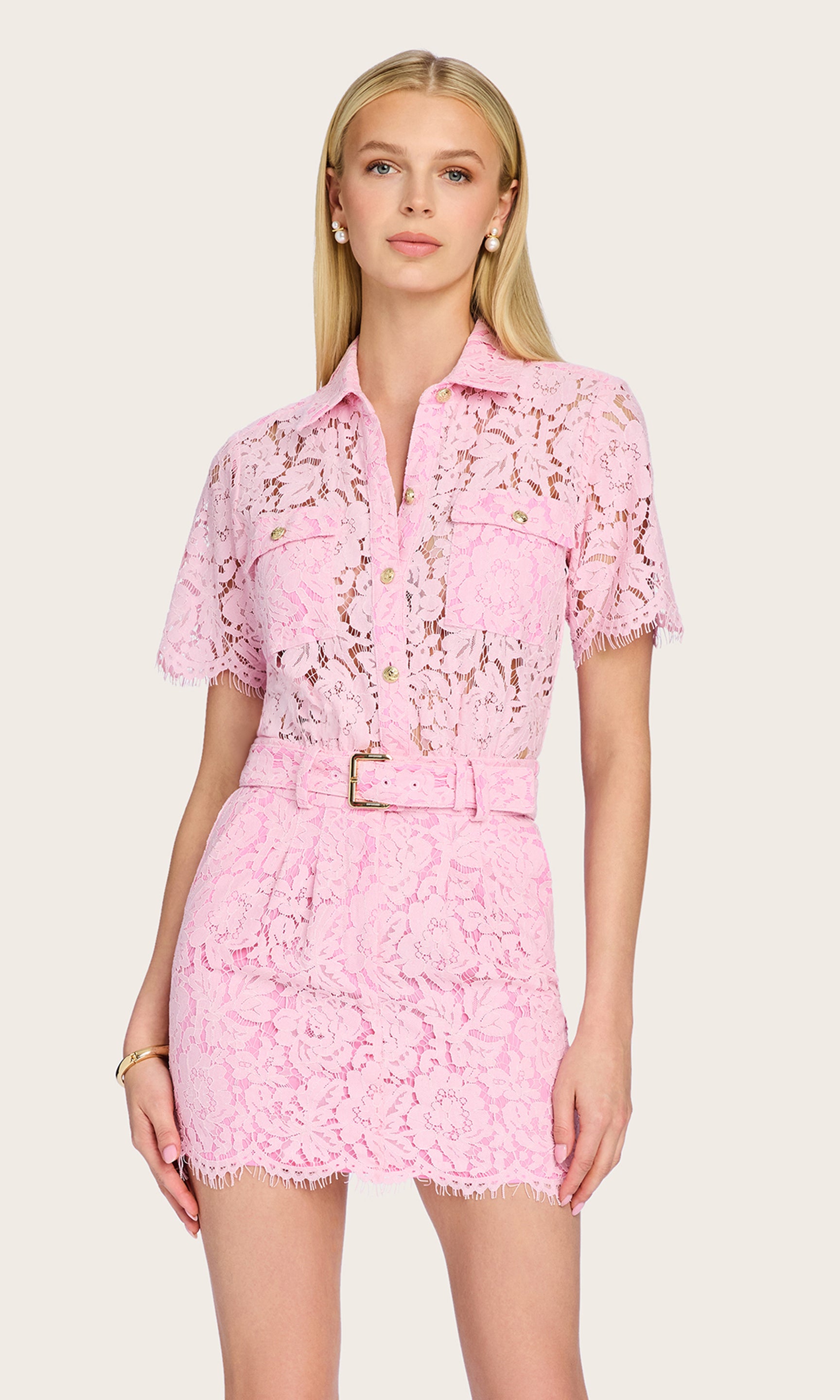 Front view of the model wearing the Morgana Lace Dress with the belt tied at the waist.