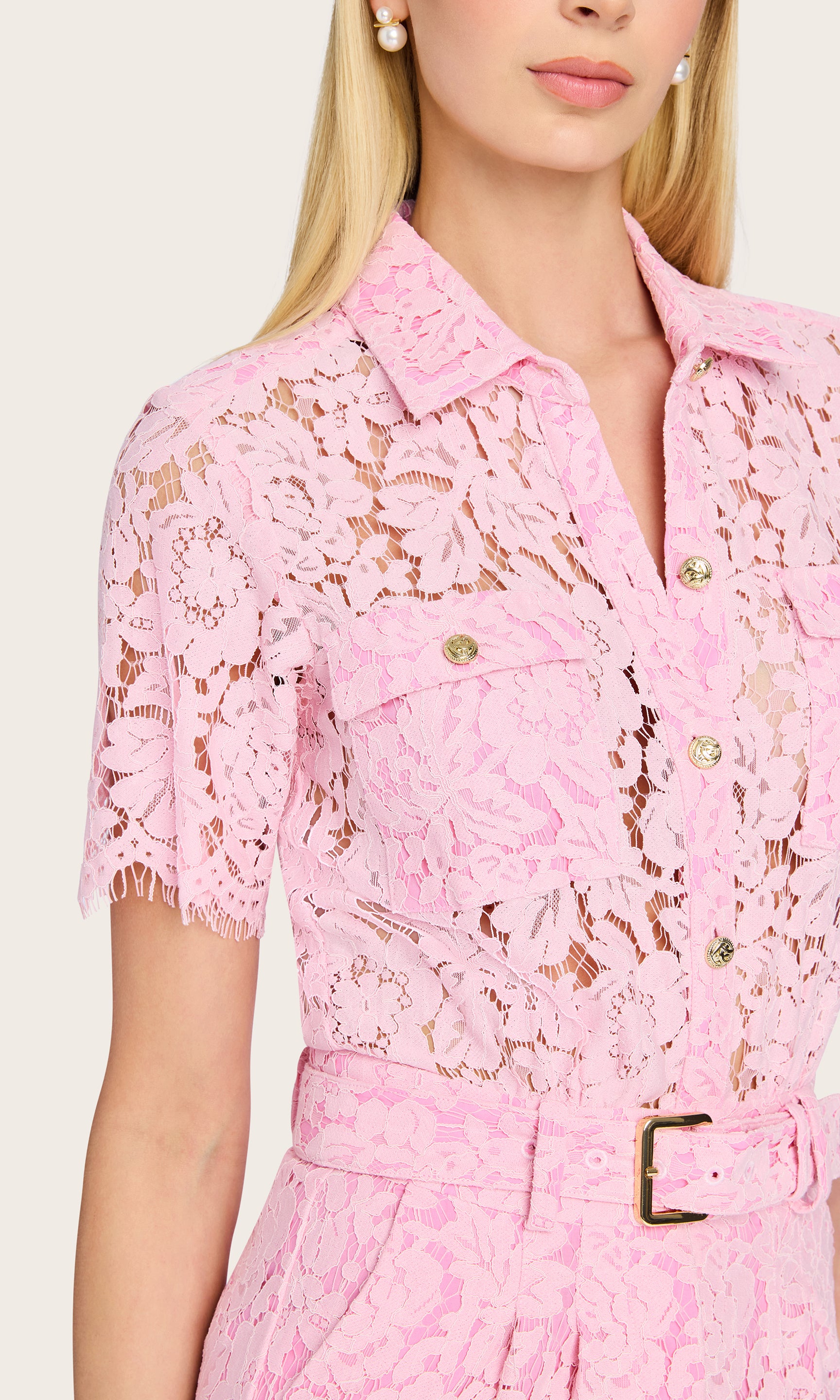 Close-up view of the Morgana Lace Dress showing the intricate floral lace and gold-tone buttons.