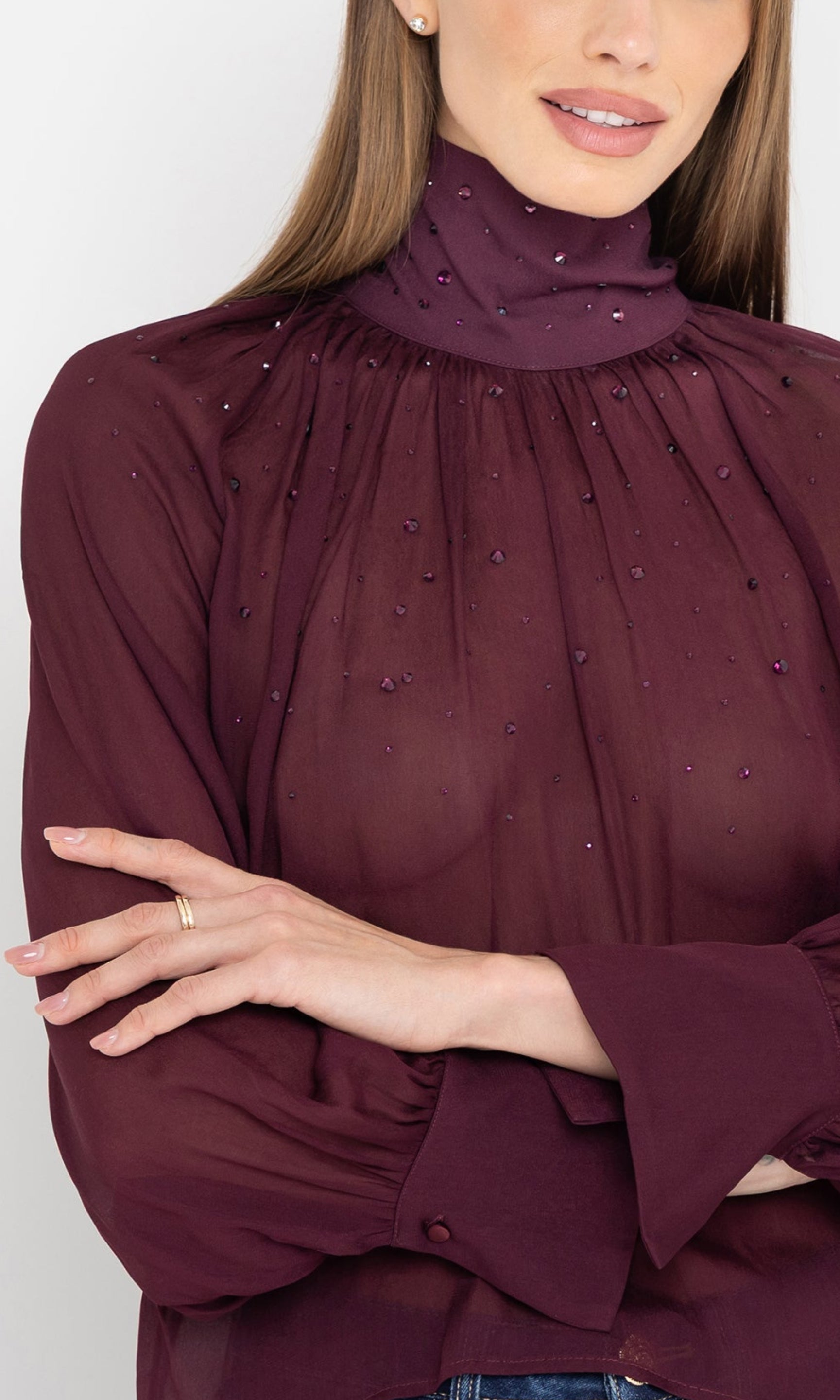Close-up front view of the noor crystal blouse showing pleated neckline.