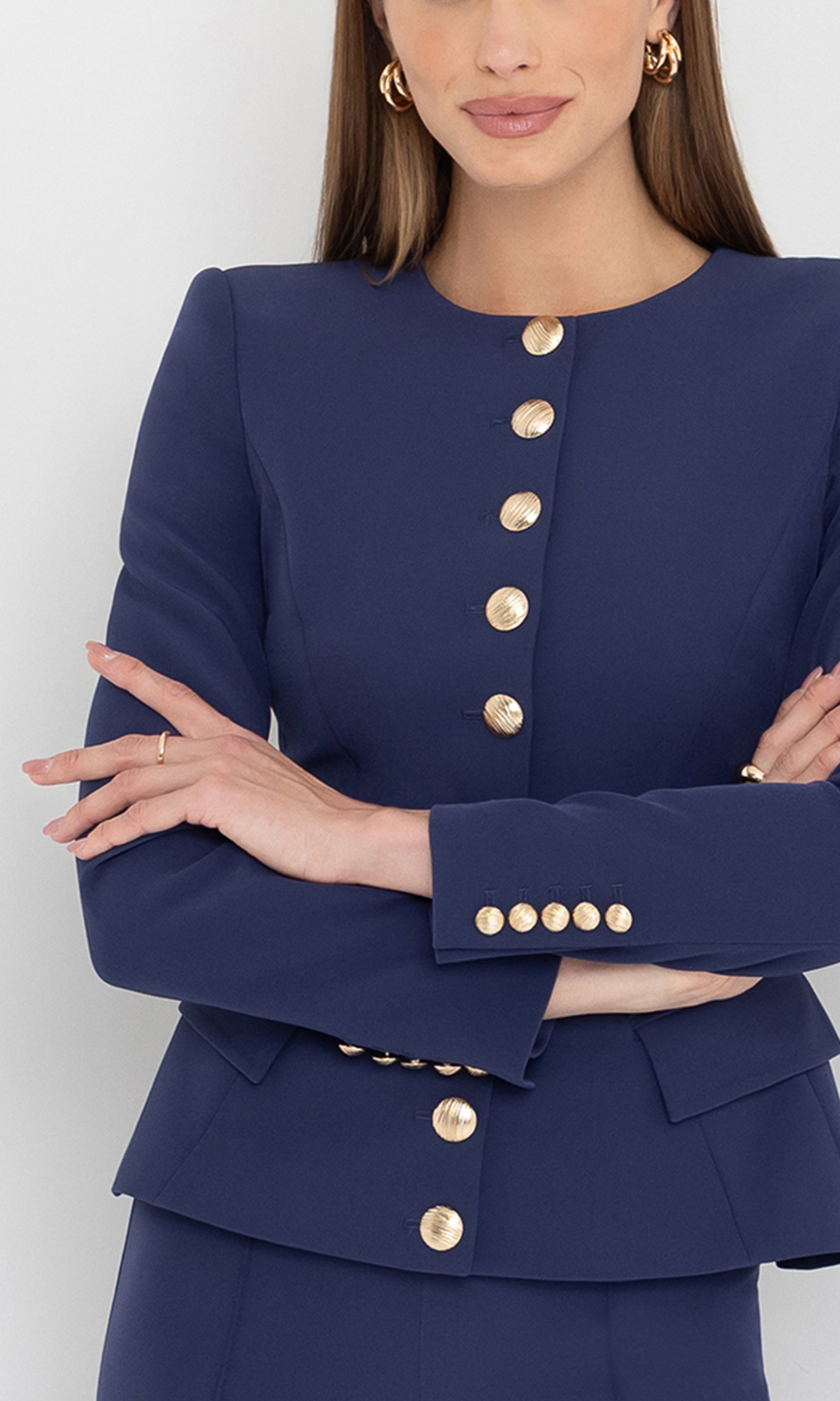 Close-up front view of the ophelia crepe jacket, highlighting the cinched waist and sharp peplum cut.