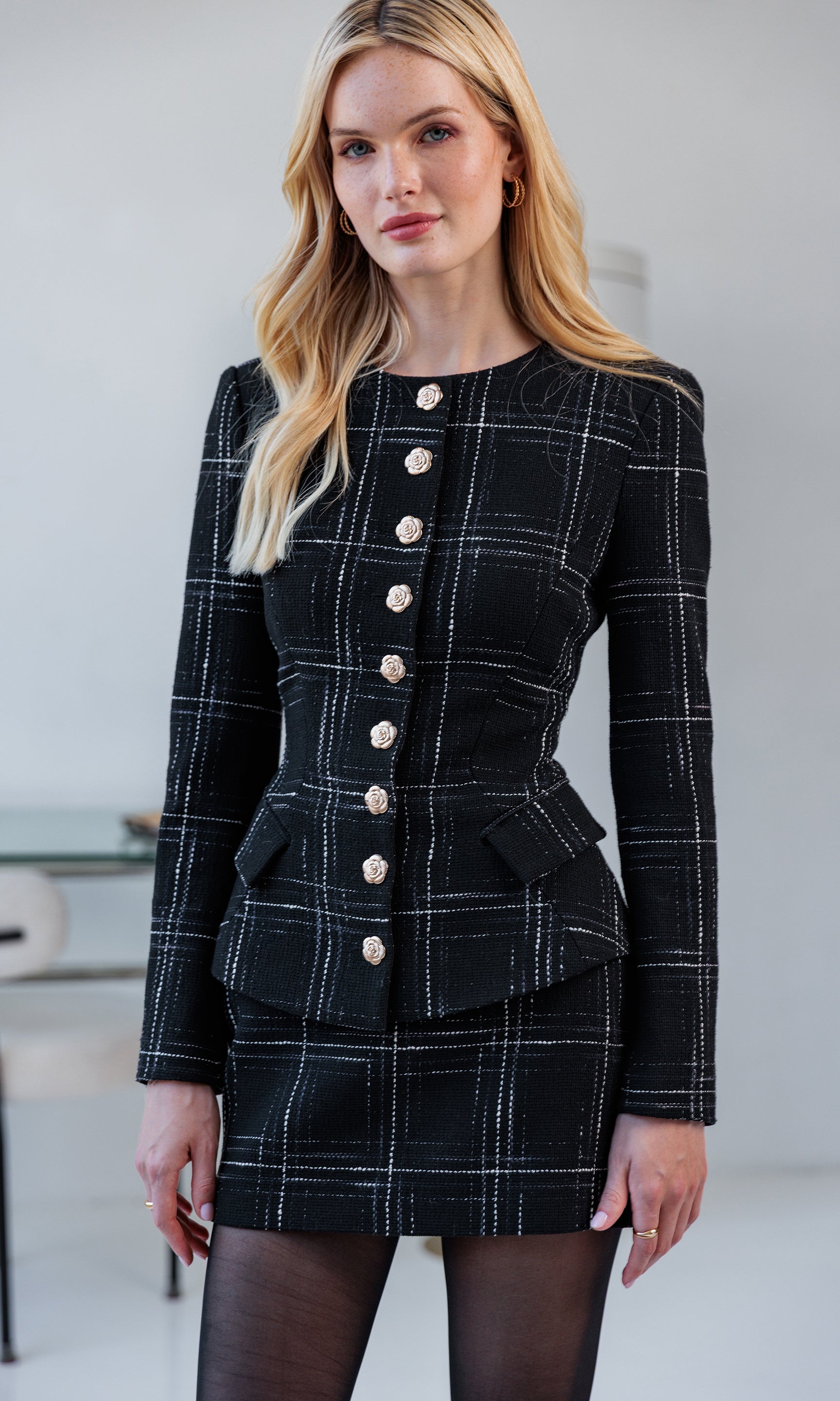 Single model front-facing in the Kendra Windowpane Tweed Skirt and matching jacket with black tights.