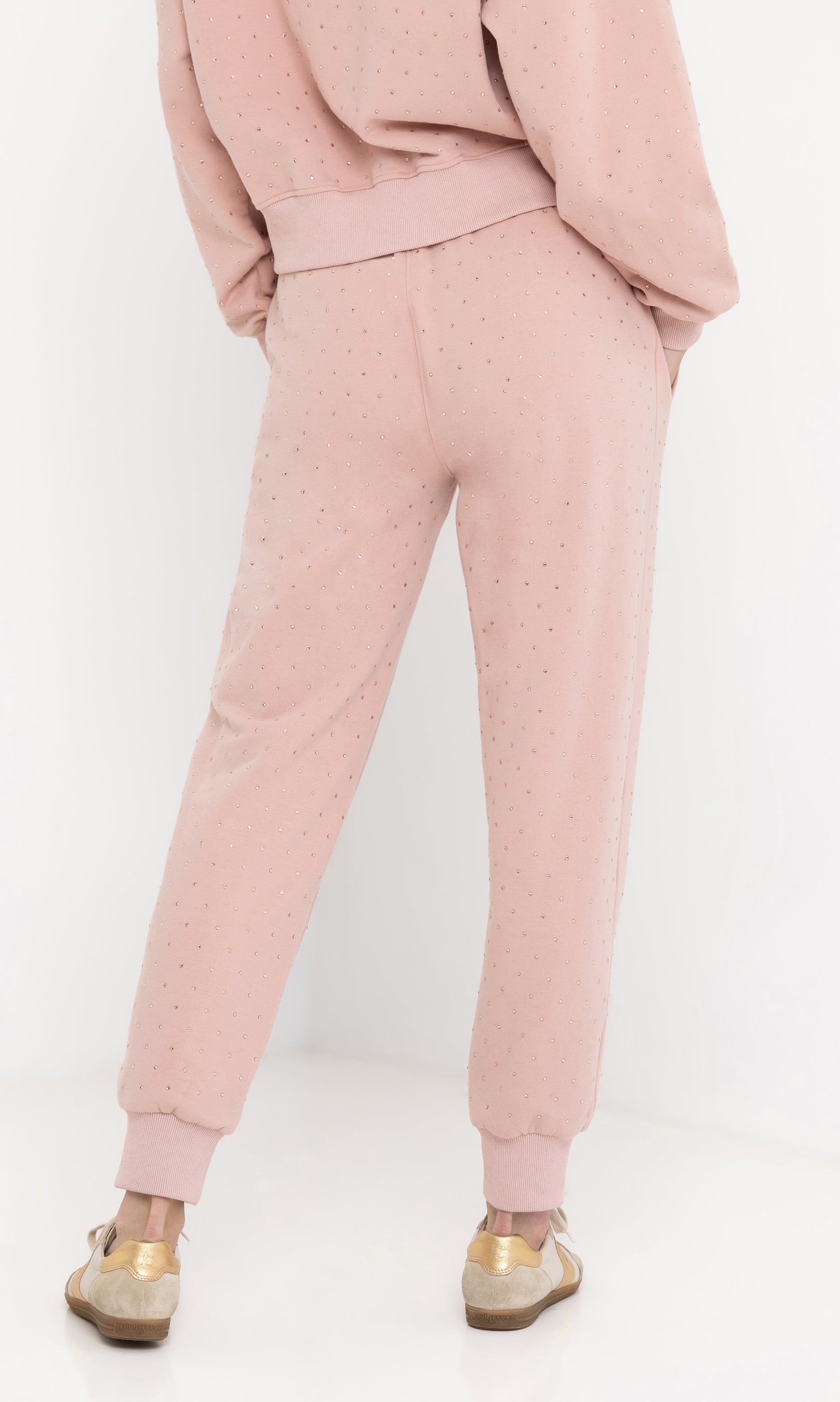 Rear view of the ruel crystal sweatpants displaying the fit and pockets.