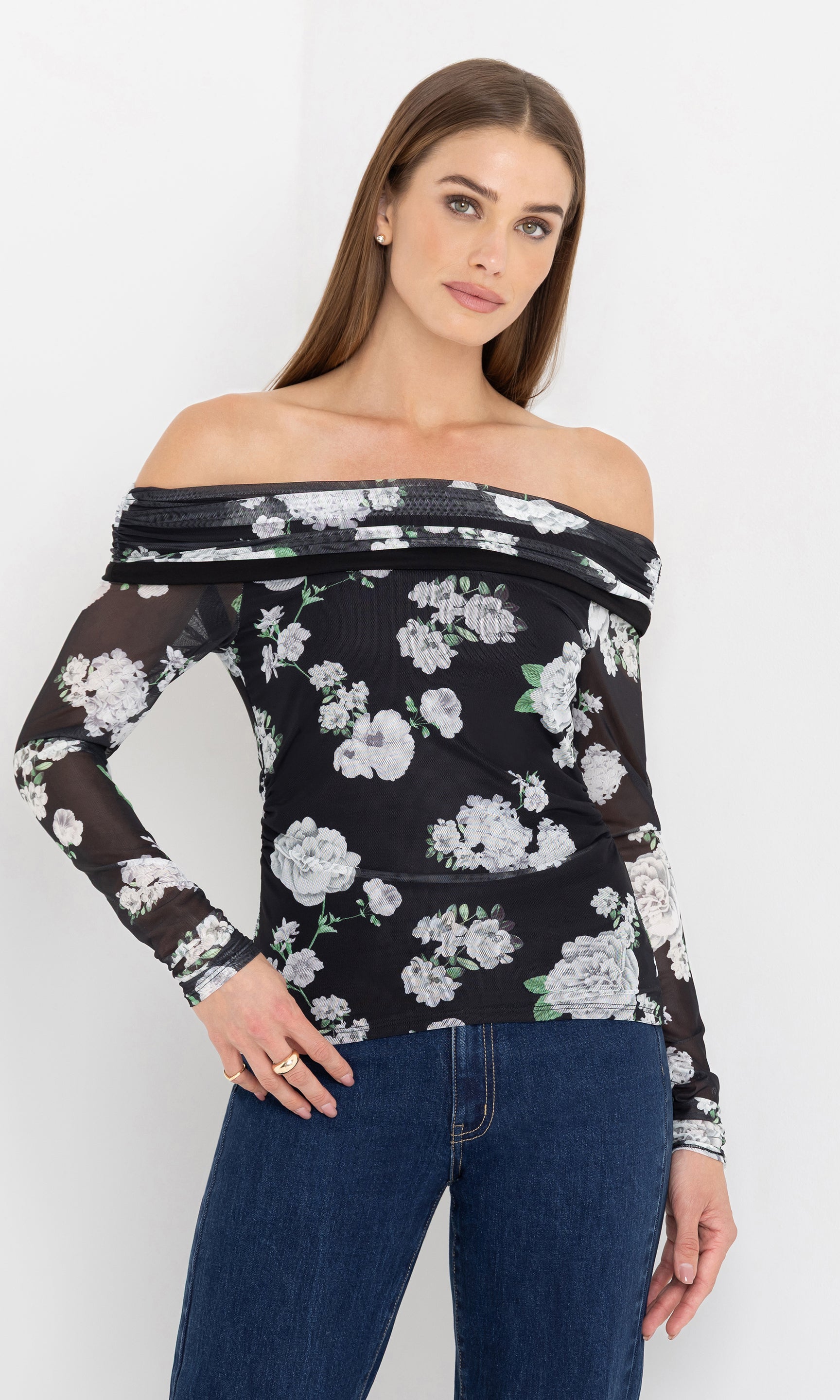 Front view of the model wearing the romeo floral mesh top with off-shoulder design.